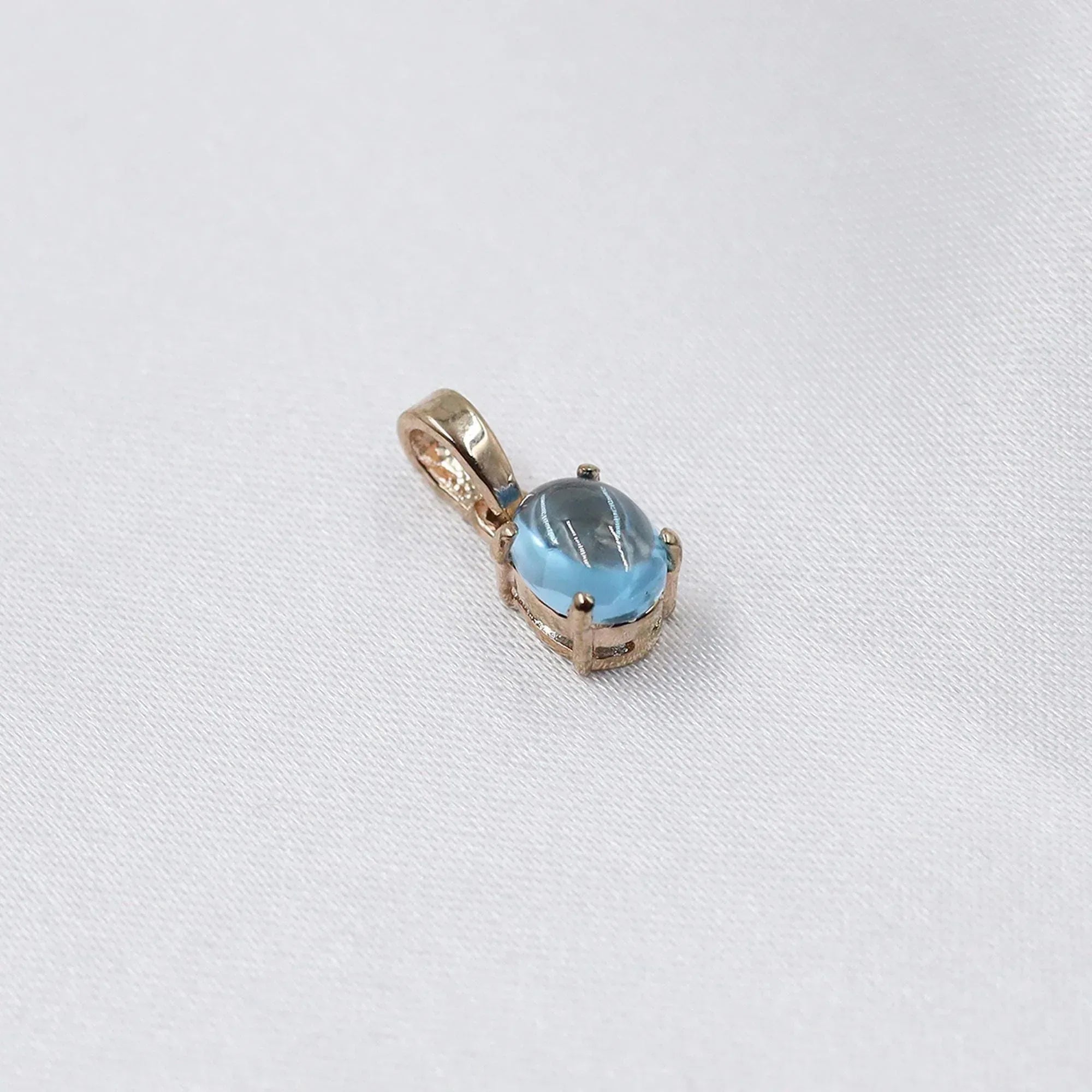 Swiss Blue Topaz Pendant: Oval Sterling Silver December Birthstone