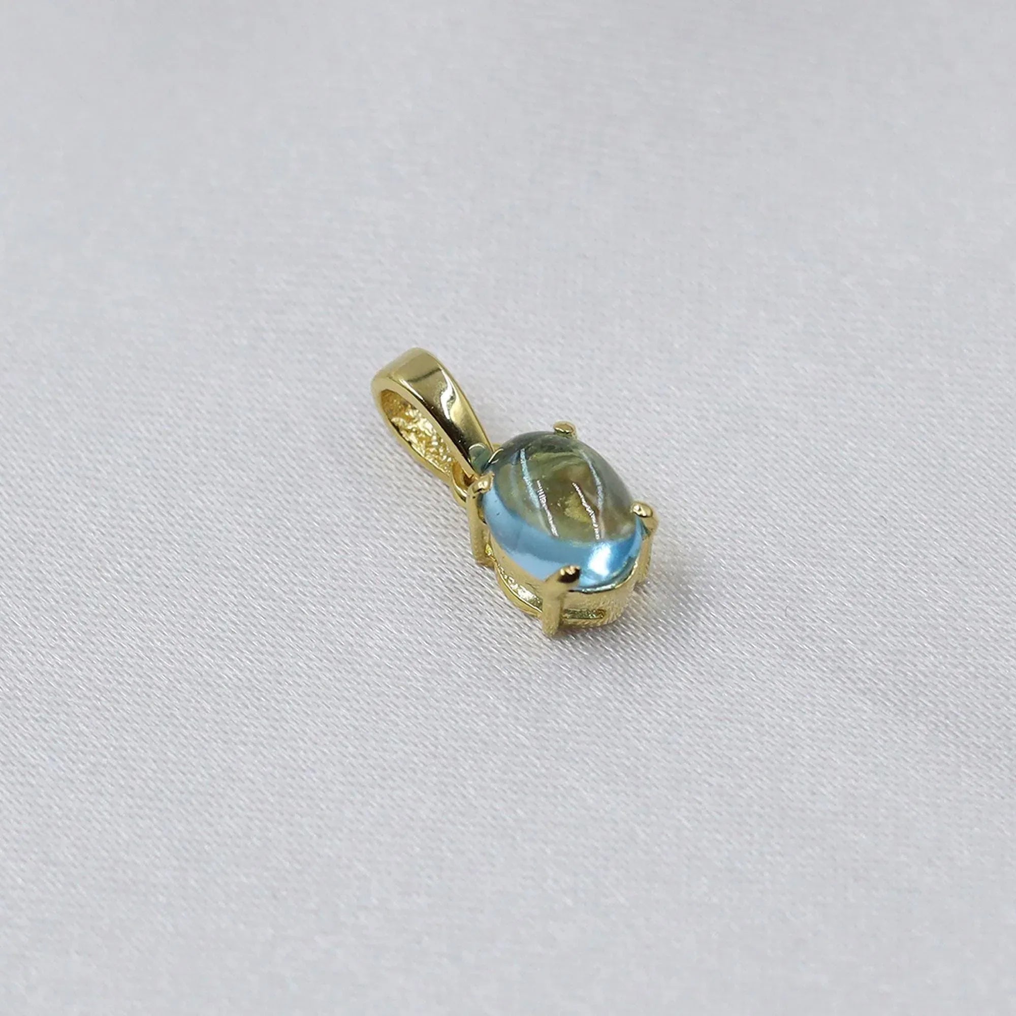 Swiss Blue Topaz Pendant: Oval Sterling Silver December Birthstone