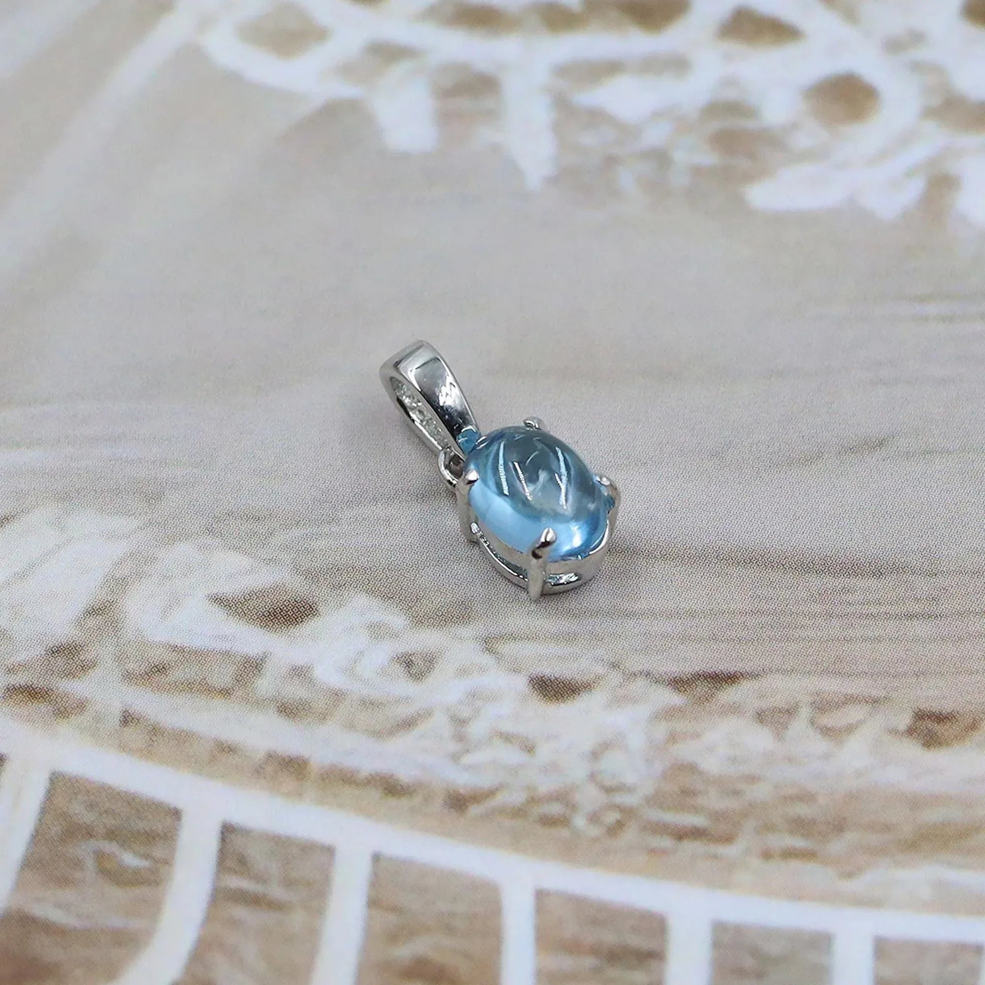 Swiss Blue Topaz Pendant: Oval Sterling Silver December Birthstone