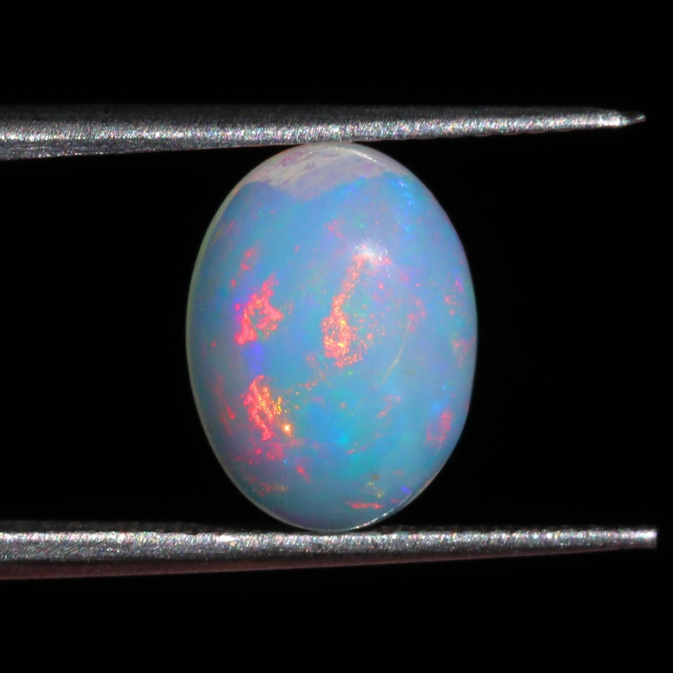 2.36 Carat Oval Ethiopian Fire Opal Cabochon: October Birthstone