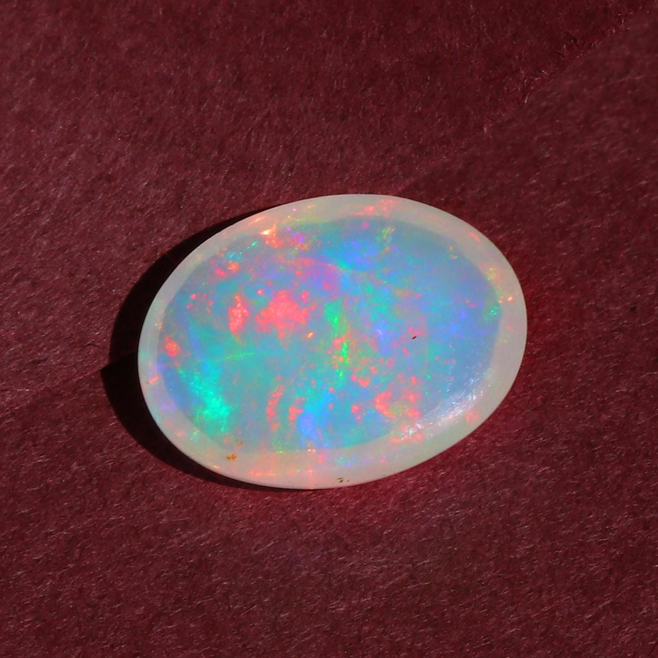 2.36 Carat Oval Ethiopian Fire Opal Cabochon: October Birthstone