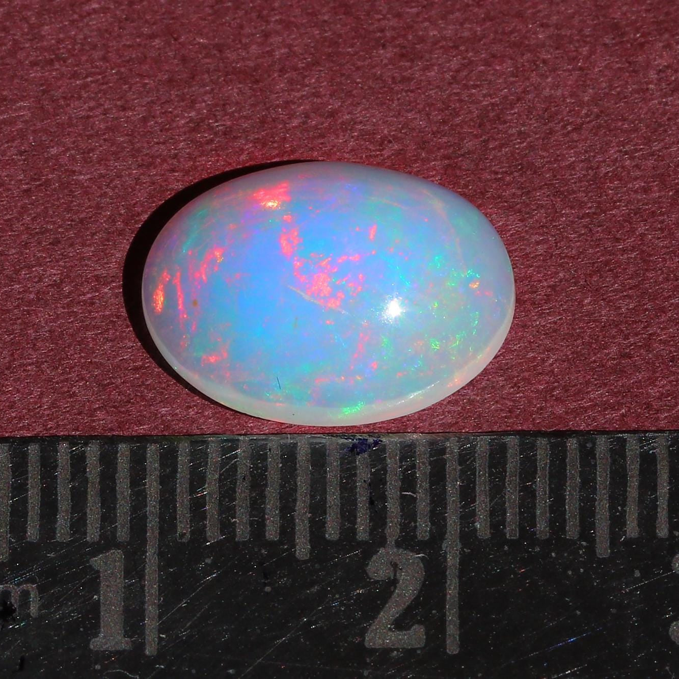 2.36 Carat Oval Ethiopian Fire Opal Cabochon: October Birthstone