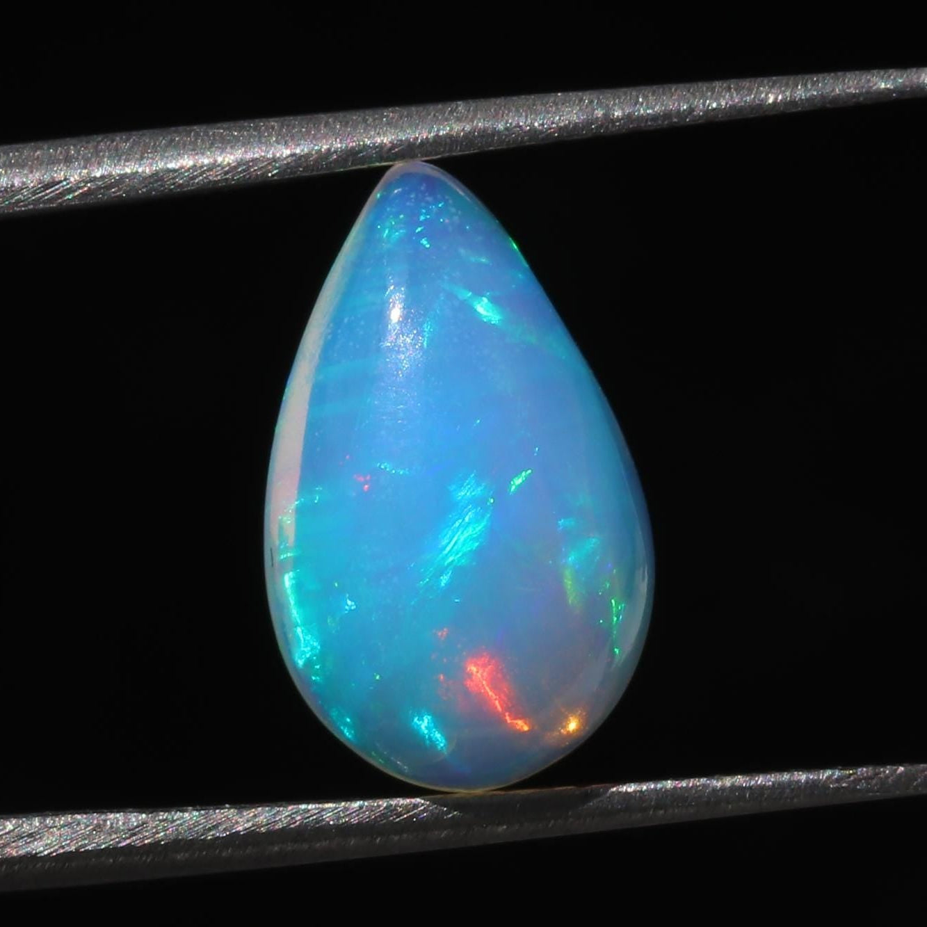Welo Opal Cabochon: 2.88 Carat Pear Shape Ethiopian Gemstone