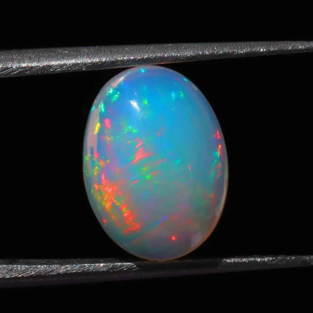 Ethiopian Opal Cabochon 4.02 ct Oval Rainbow Gemstone 10x13mm loose gemstones