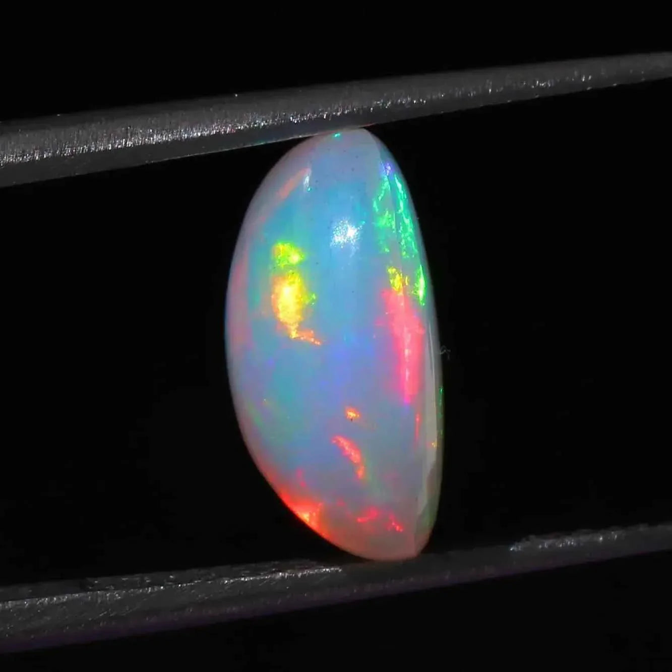 Ethiopian Opal Cabochon 4.02 ct Oval Rainbow Gemstone 10x13mm loose gemstones
