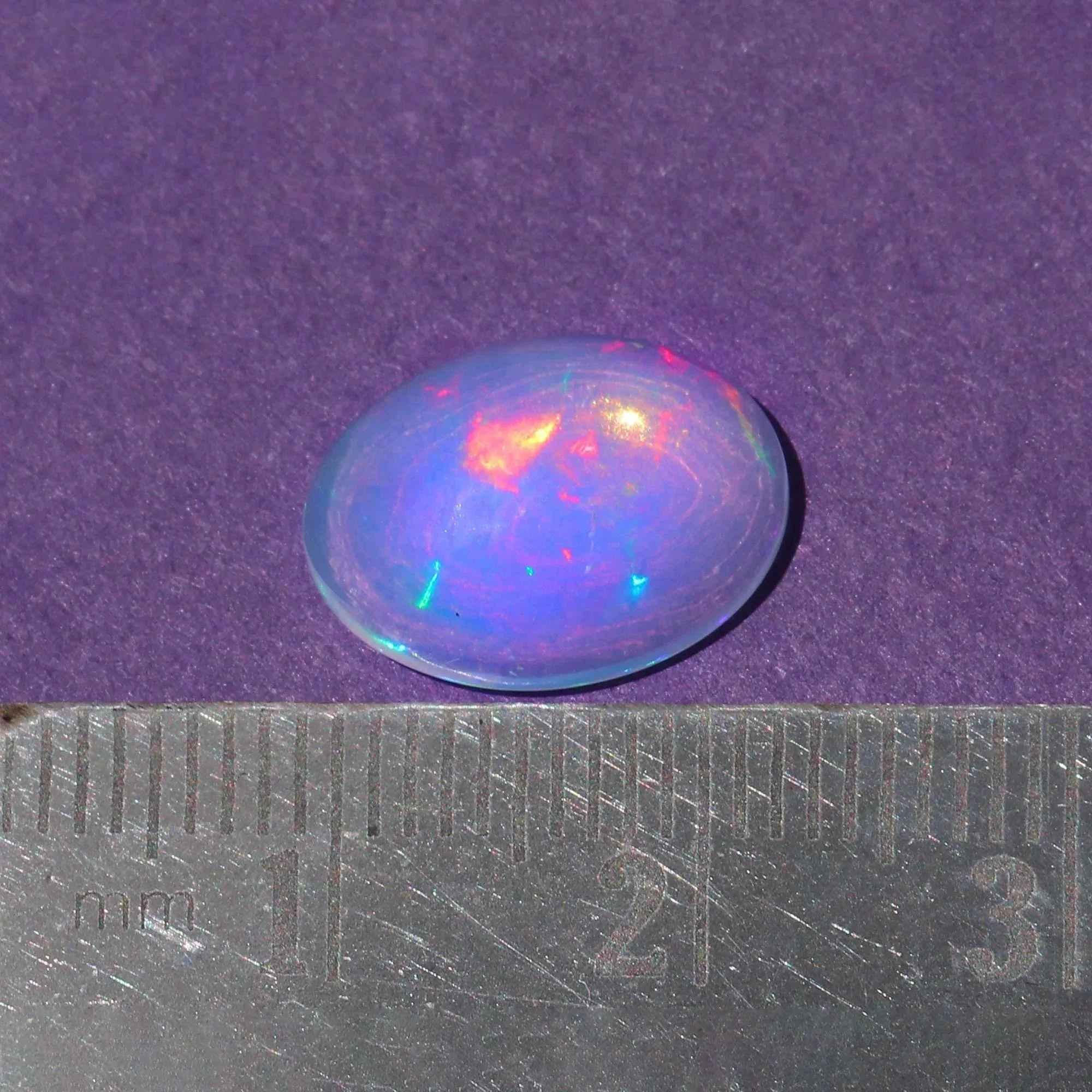 Ethiopian Opal Cabochon: 2.96ct Rainbow Fire Gemstone, 10x14mm loose gemstones