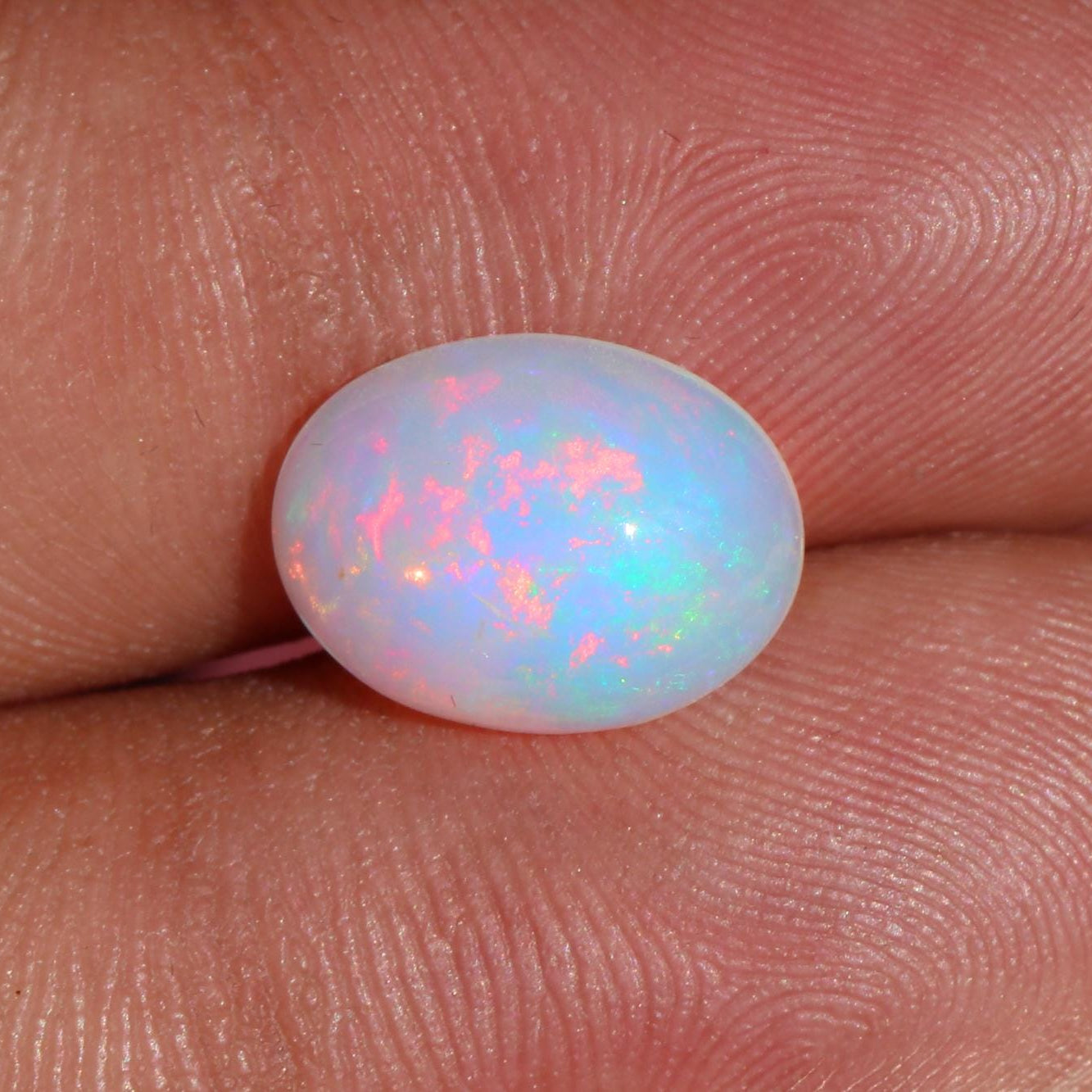 2.36 Carat Oval Ethiopian Fire Opal Cabochon: October Birthstone