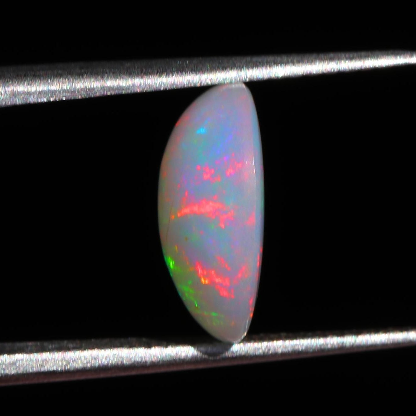 2.36 Carat Oval Ethiopian Fire Opal Cabochon: October Birthstone