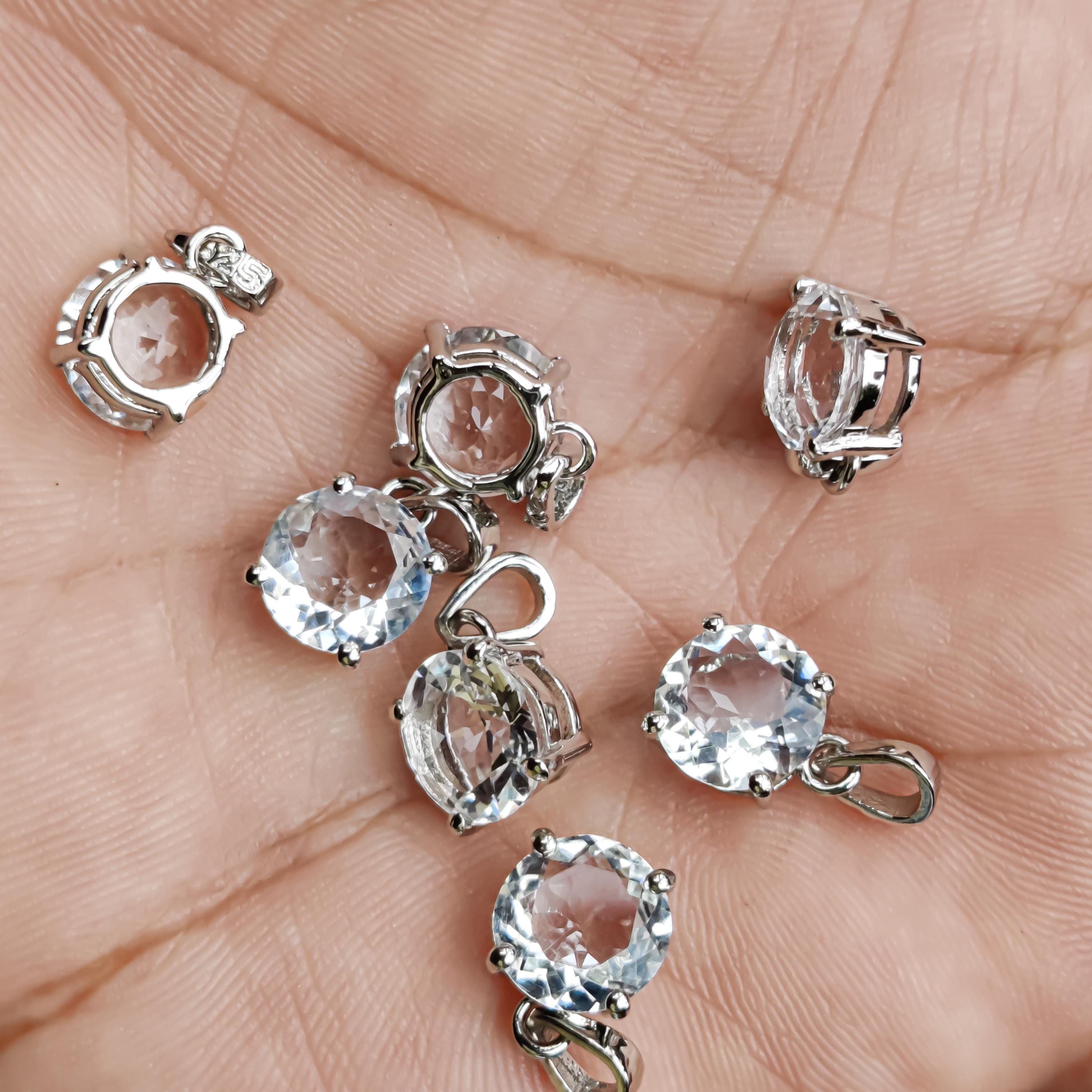 Sterling Silver Petalite Pendant – 9mm Faceted Round Gemstone