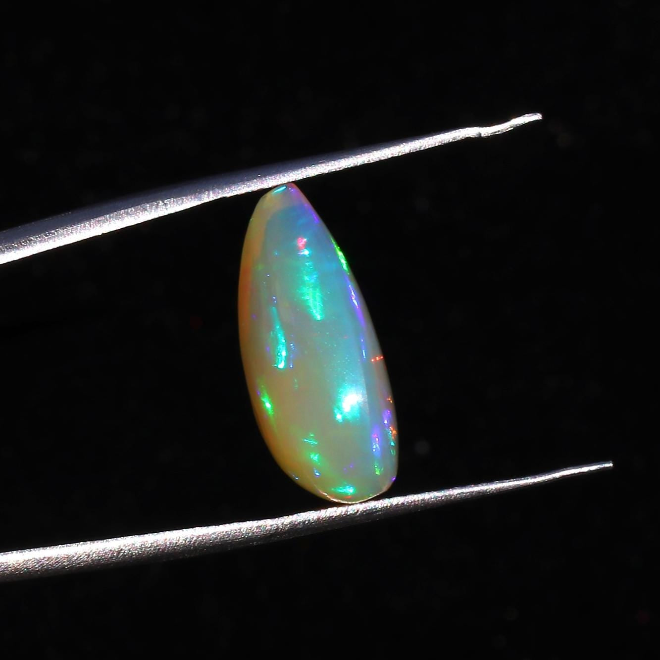 Ethiopian Opal Gemstone: 7.82 Carat Pear Cabochon for Jewelry