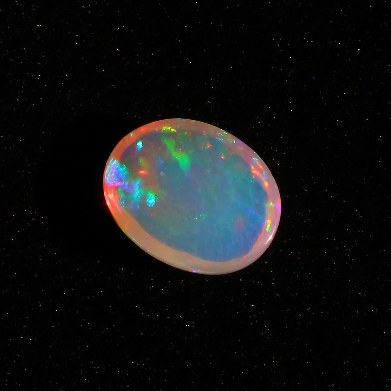 Ethiopian Opal Gemstone: 7.25 Cts Oval Cabochon for Jewelry