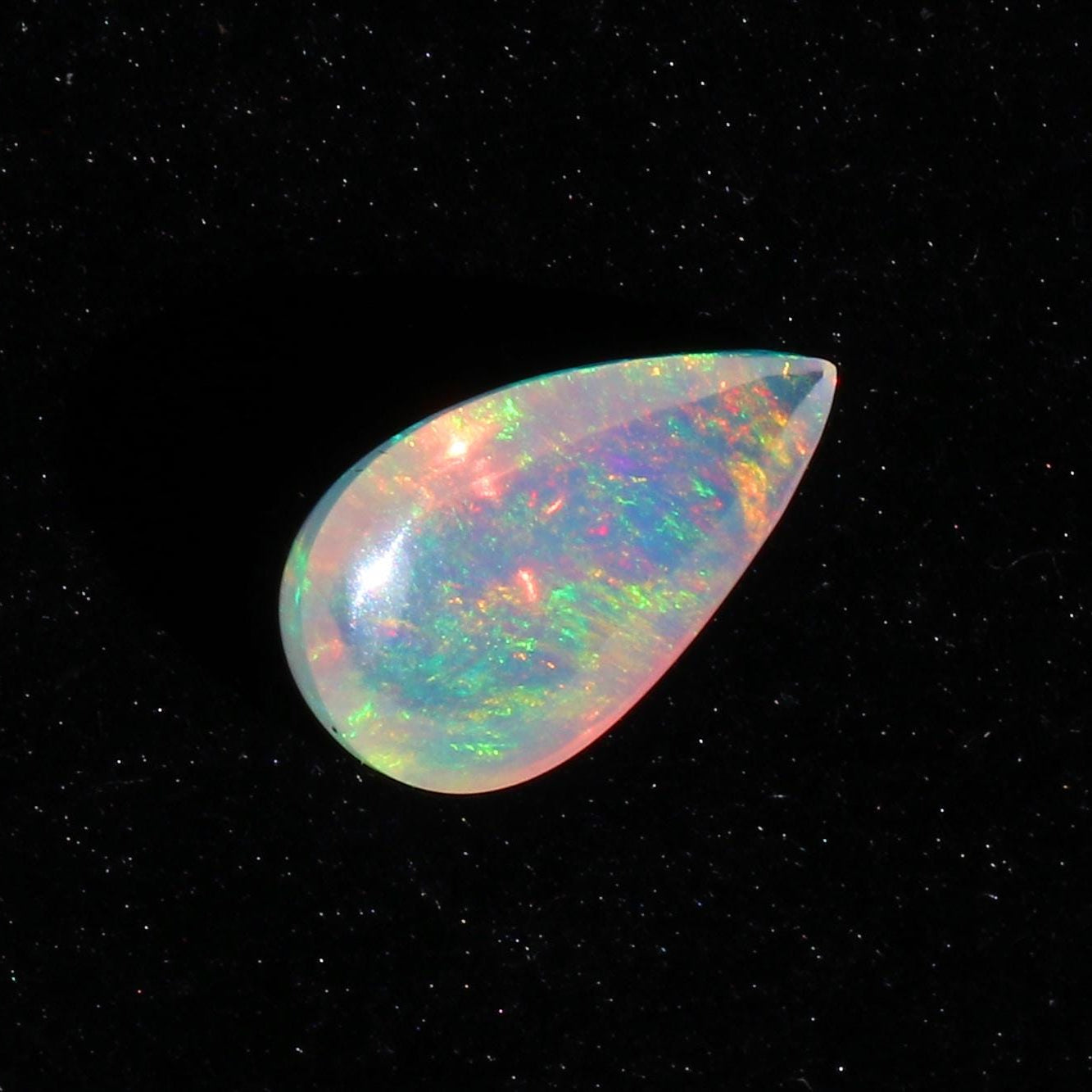Ethiopian Welo Opal Cabochon: Rainbow Fire Pear-Cut Gemstone, 4.77 CT