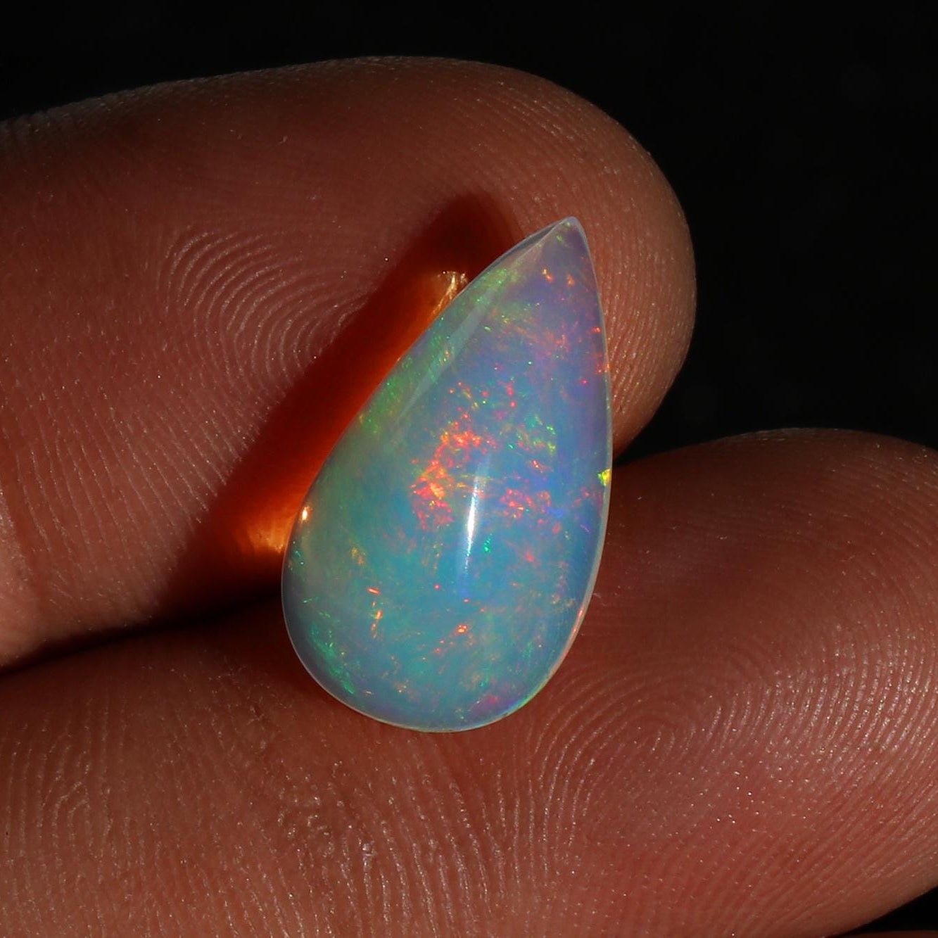 Ethiopian Welo Opal Cabochon: Rainbow Fire Pear-Cut Gemstone, 4.77 CT