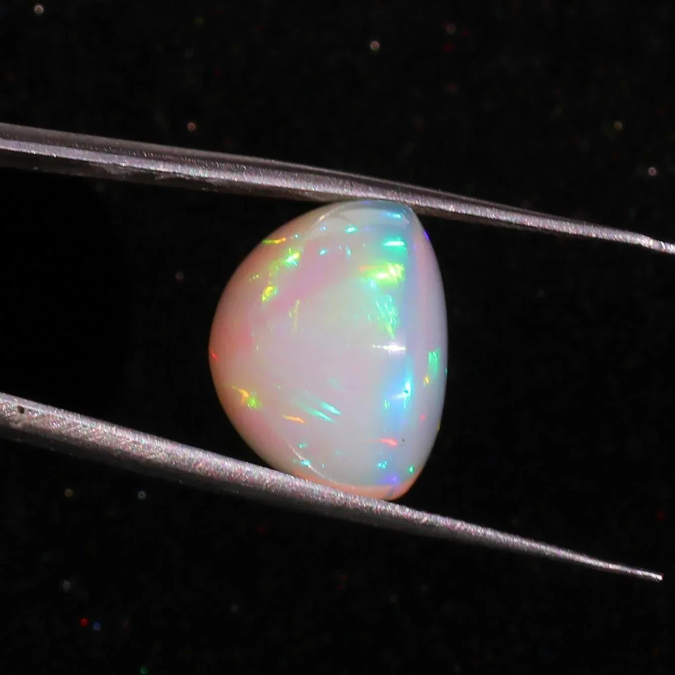 Ethiopian Welo Opal Cabochon: Rainbow Fire Gemstone, 26.7 ct loose gemstones