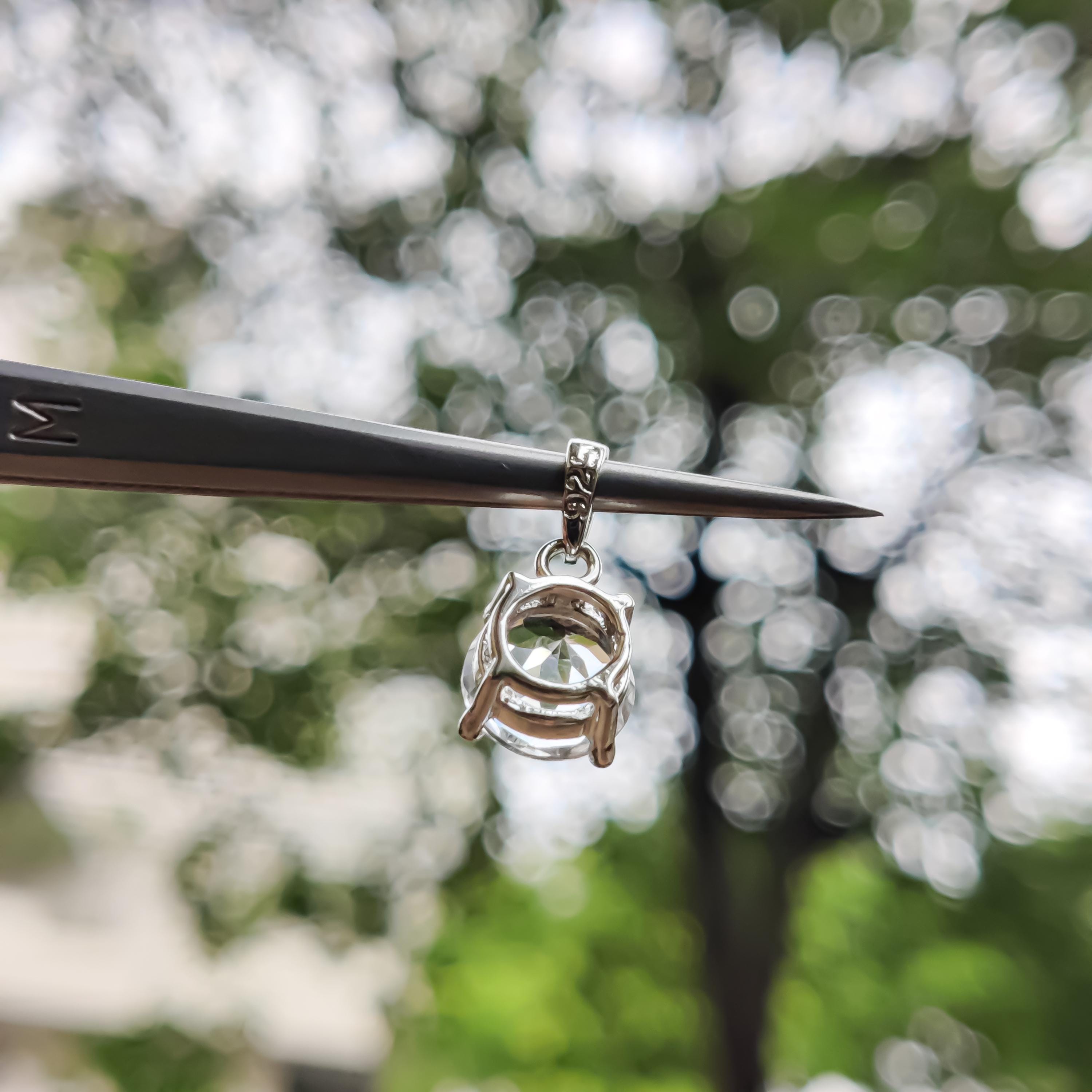 Sterling Silver Petalite Pendant – 9mm Faceted Round Gemstone