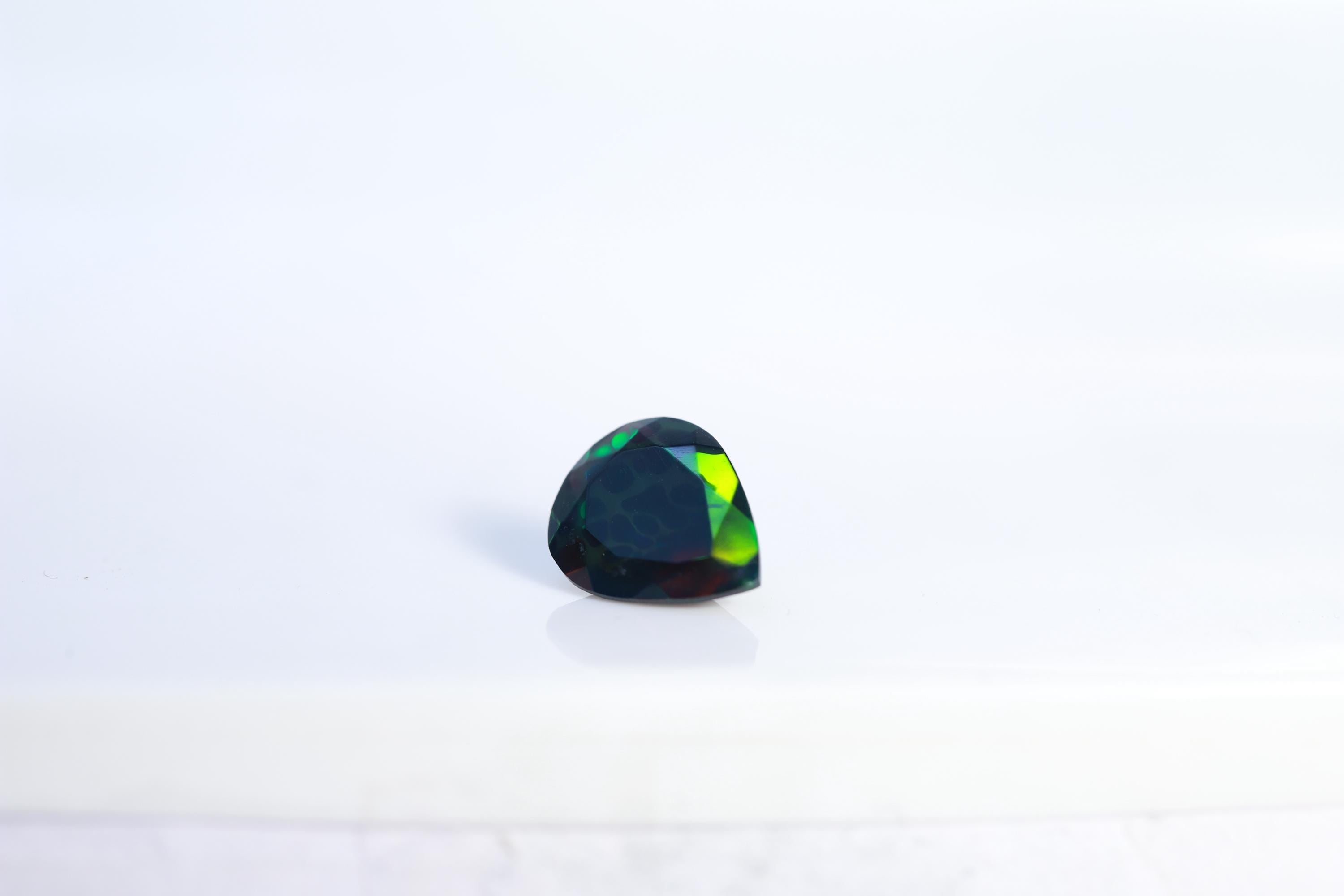 Welo Ethiopian Black Opal Pear Cabochon: 9x11mm Loose Gemstone