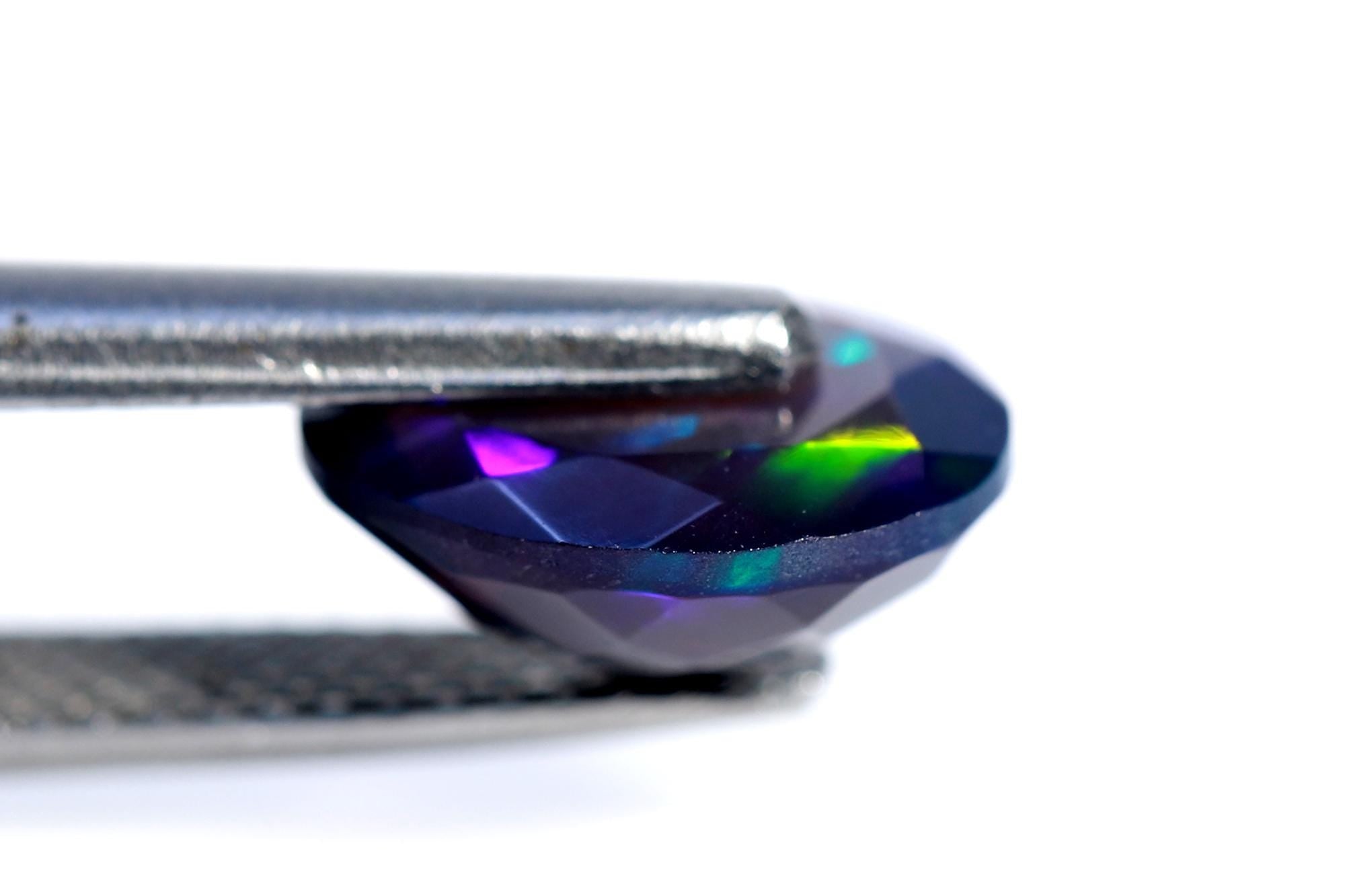 Ethiopian Welo Opal Gemstone: Faceted Black Oval Cut, 1.48 ct