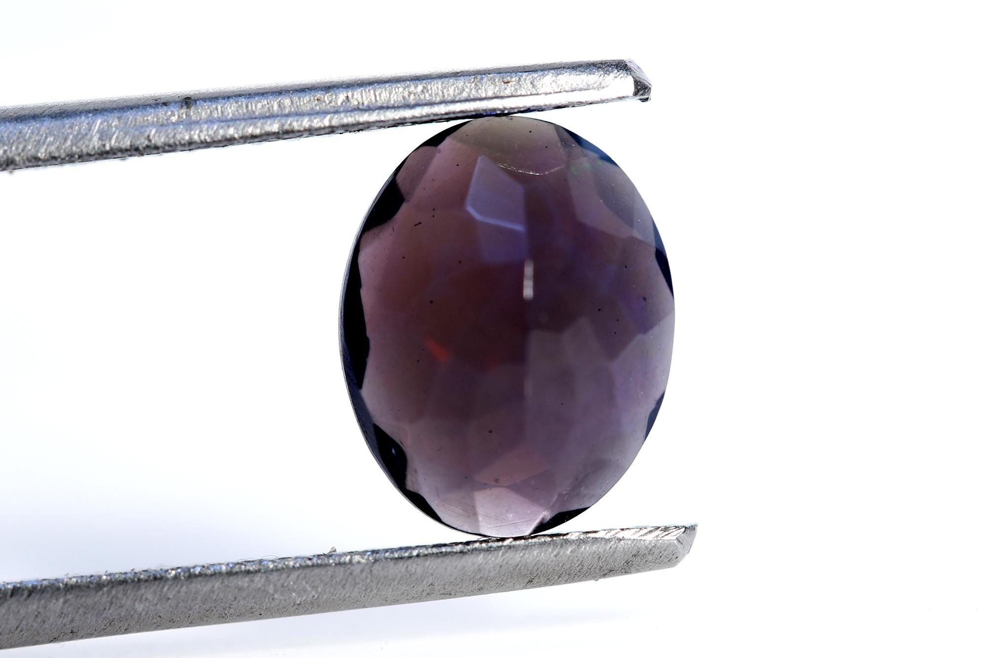 Ethiopian Welo Opal Gemstone: Faceted Black Oval Cut, 1.48 ct