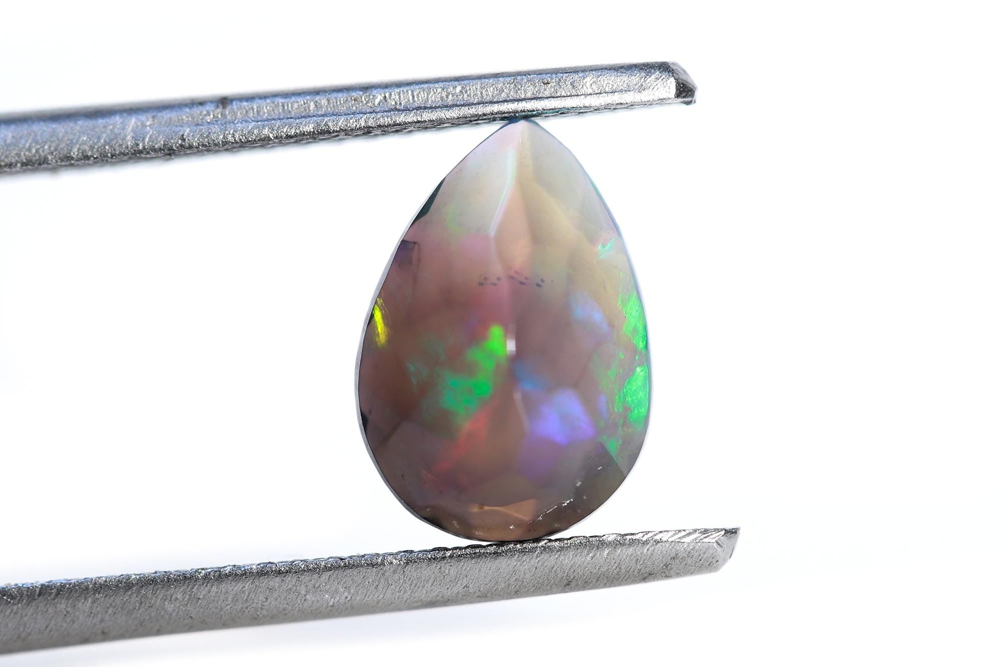 Ethiopian Black Opal Gemstone: 7x10mm Faceted Pear Cut, 1.12 Cts