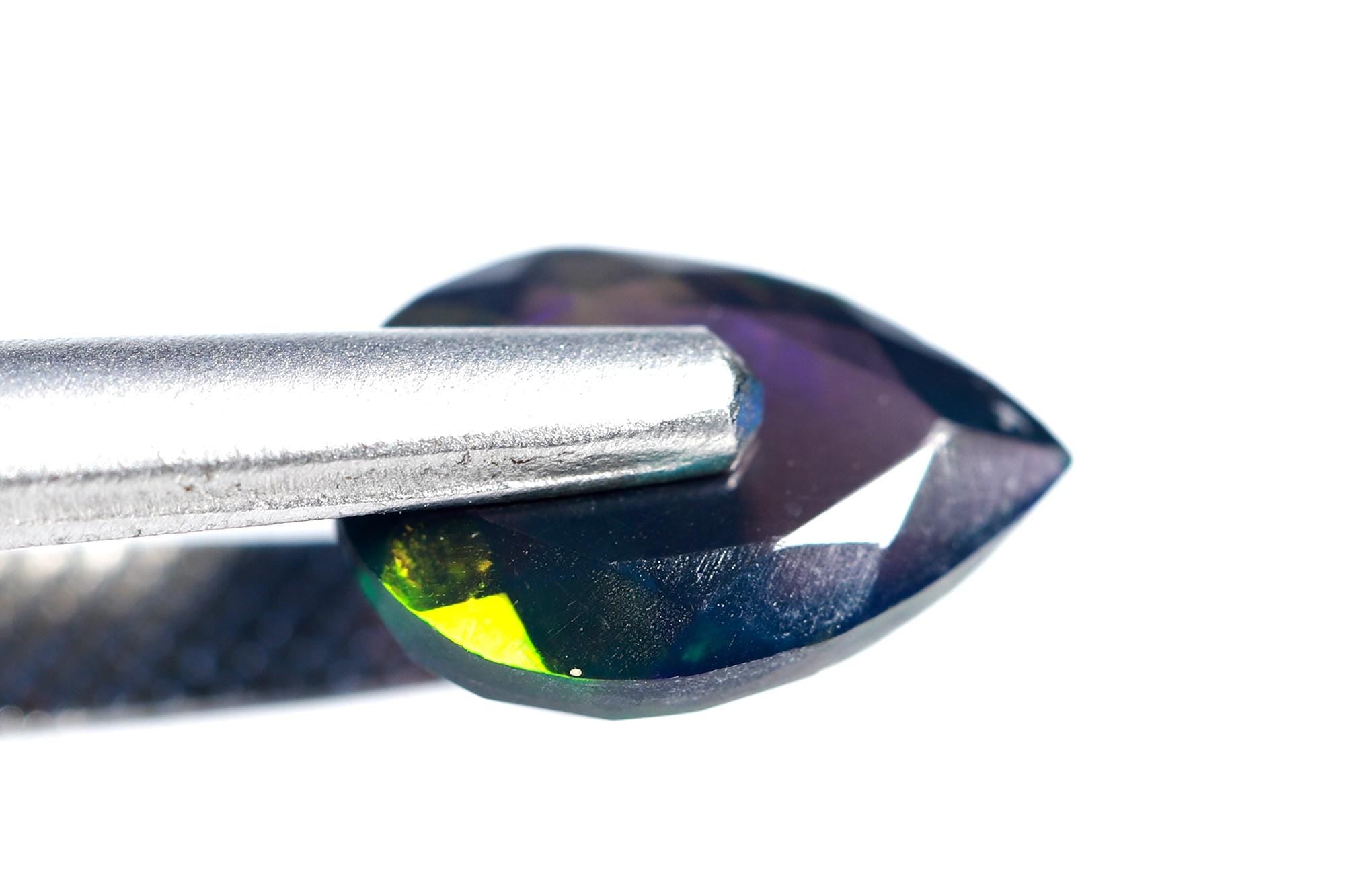 Ethiopian Black Opal Pear Cabochon: Multi-Fire Gemstone (7x10 mm