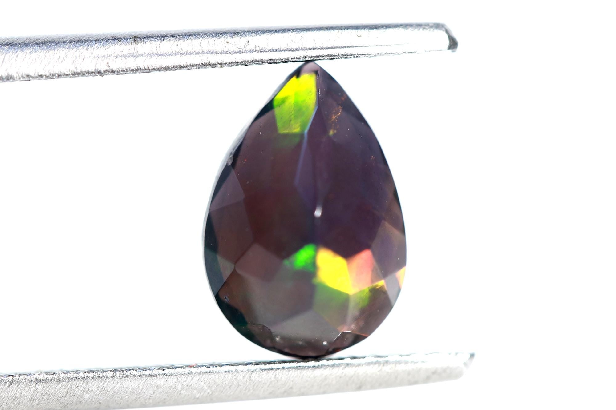 Ethiopian Black Opal Pear Cabochon: Multi-Fire Gemstone (7x10 mm