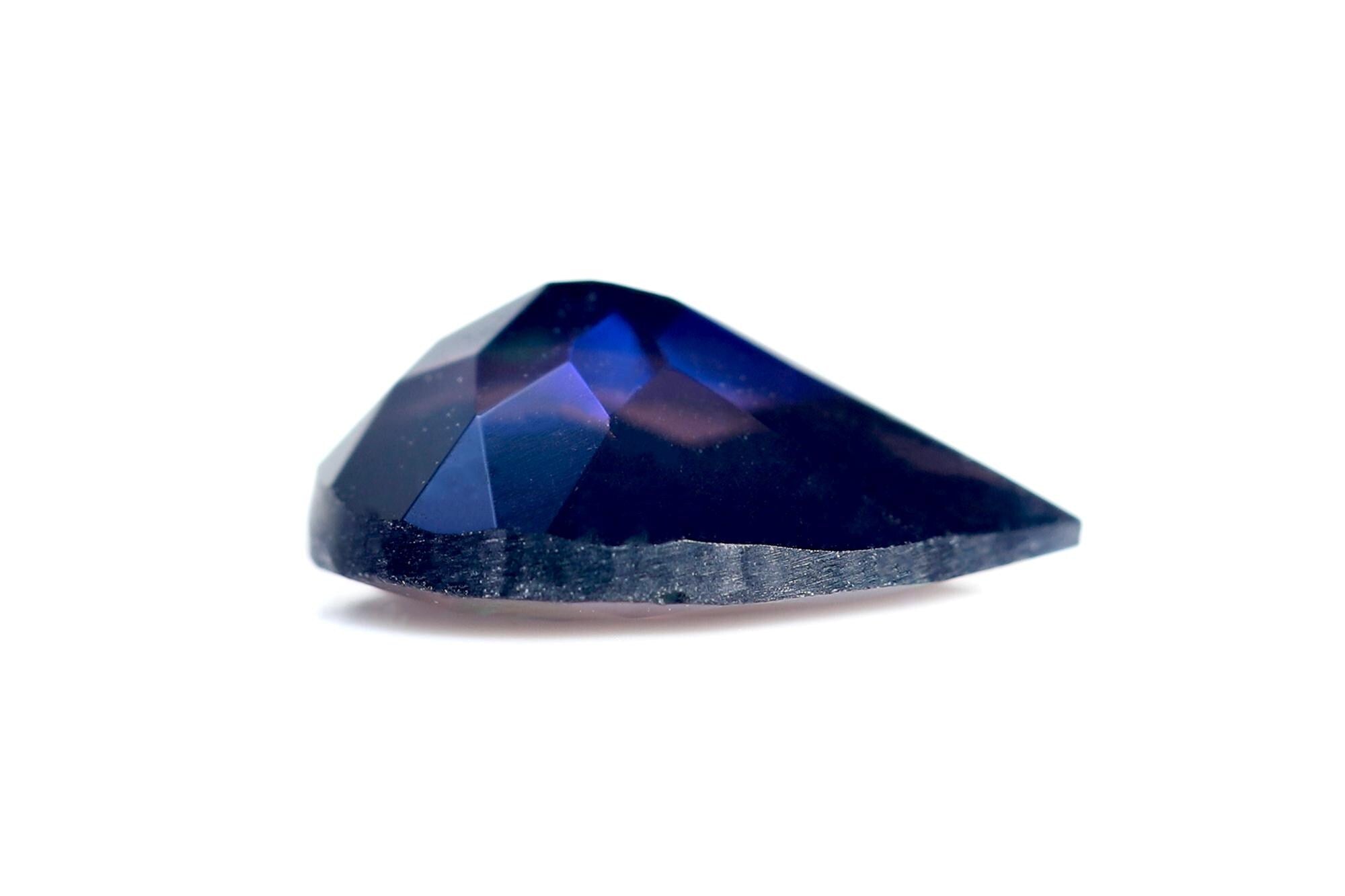 Faceted Black Ethiopian Opal Gemstone: Pear Shape, 7x10mm