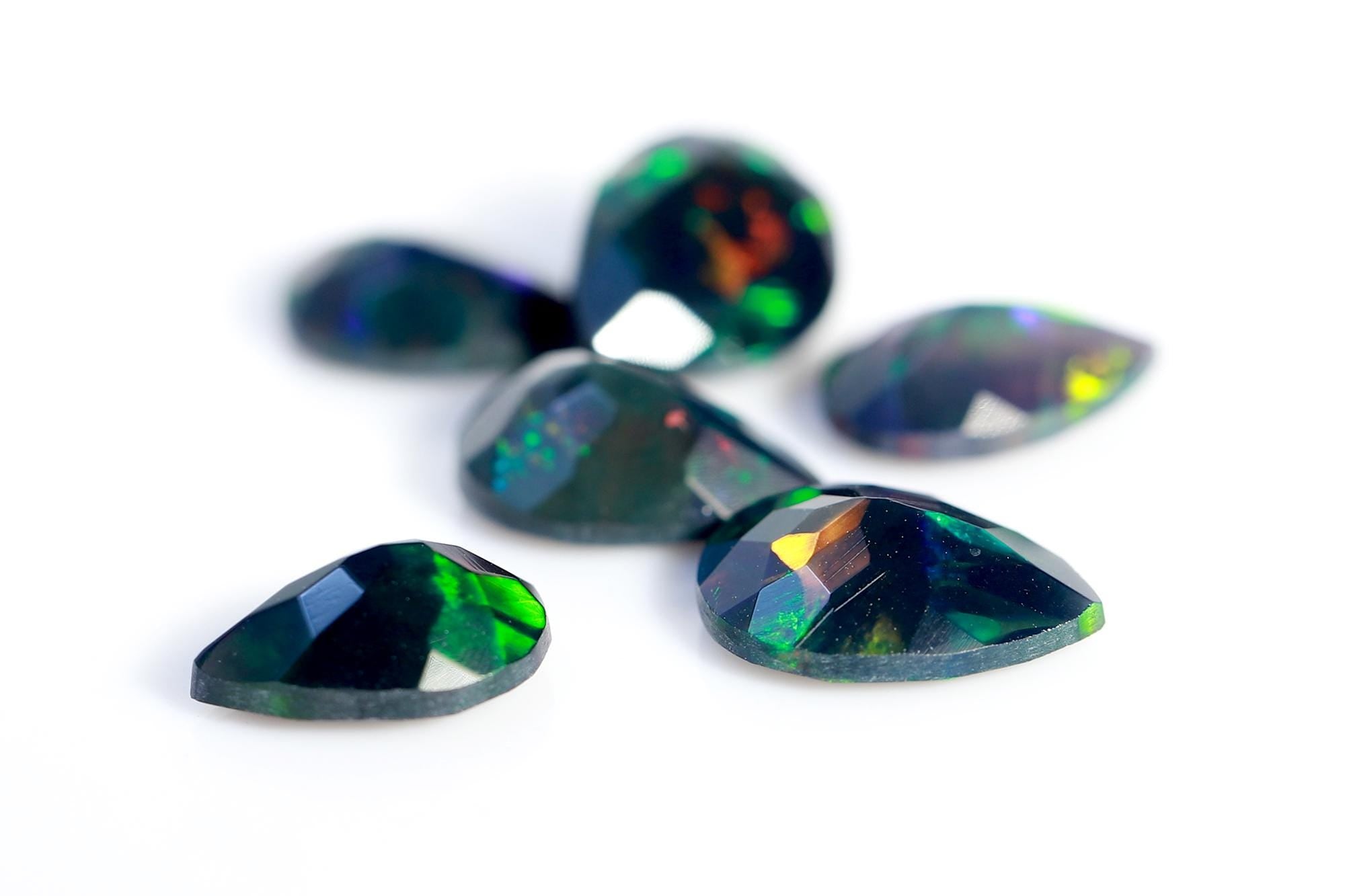 4.78 Ct Ethiopian Welo Black Opal Pear Cabochon: Multi-Fire Gemstone