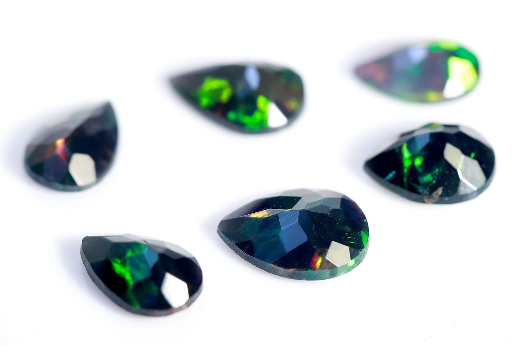 4.78 Ct Ethiopian Welo Black Opal Pear Cabochon: Multi-Fire Gemstone