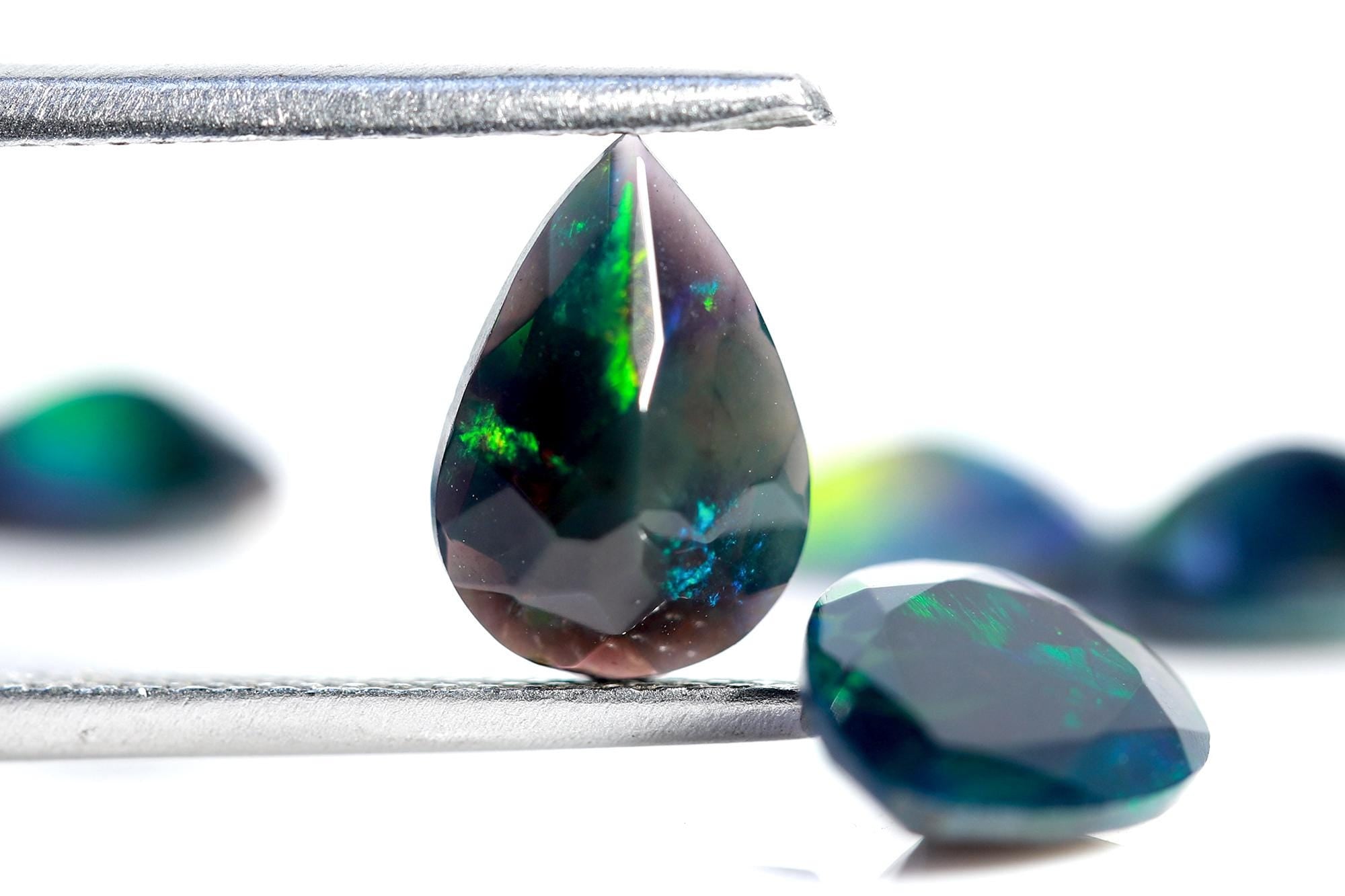 4.78 Ct Ethiopian Welo Black Opal Pear Cabochon: Multi-Fire Gemstone