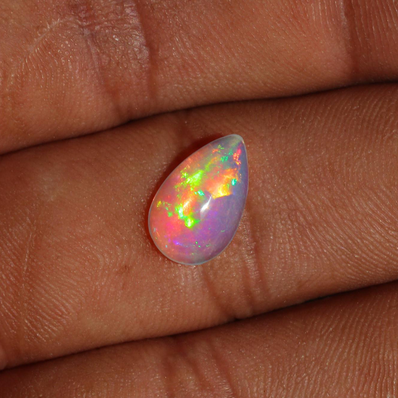 Welo Ethiopian Fire Opal Cabochon: Rainbow Gemstone for Jewelry (1.67 Cts, 13x8 mm