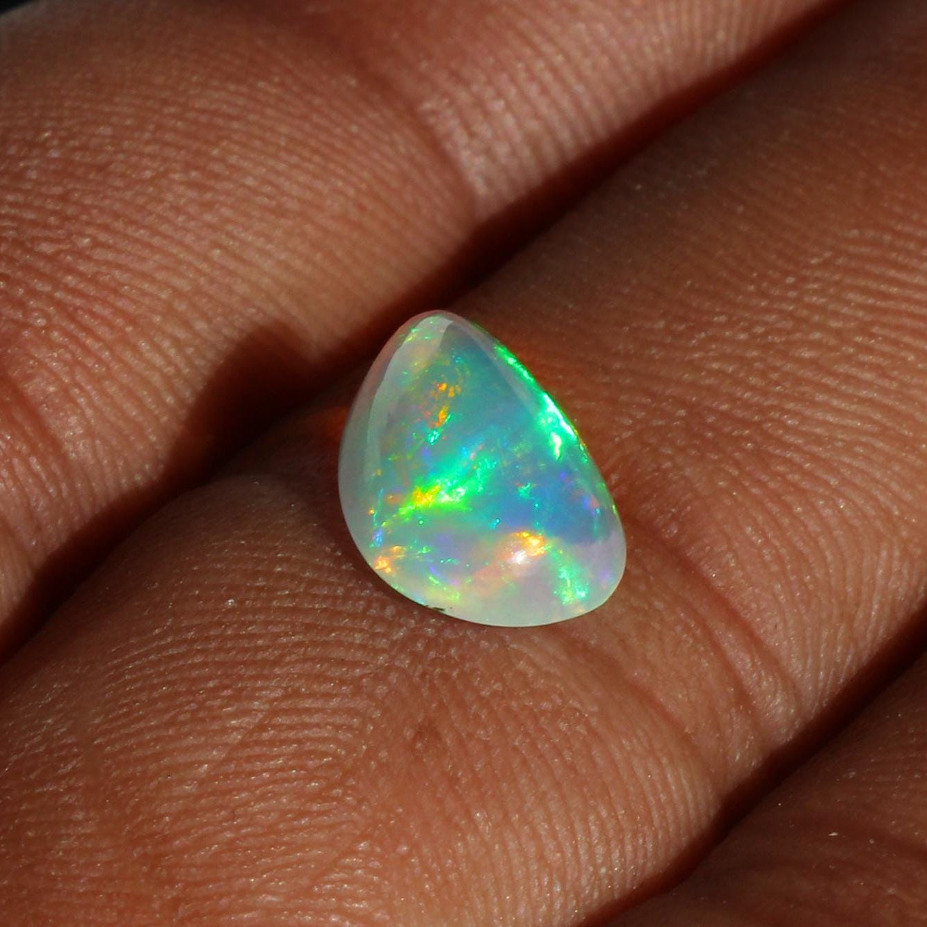 Welo Ethiopian Fire Opal Cabochon: Rainbow Gemstone for Jewelry (1.67 Cts, 13x8 mm
