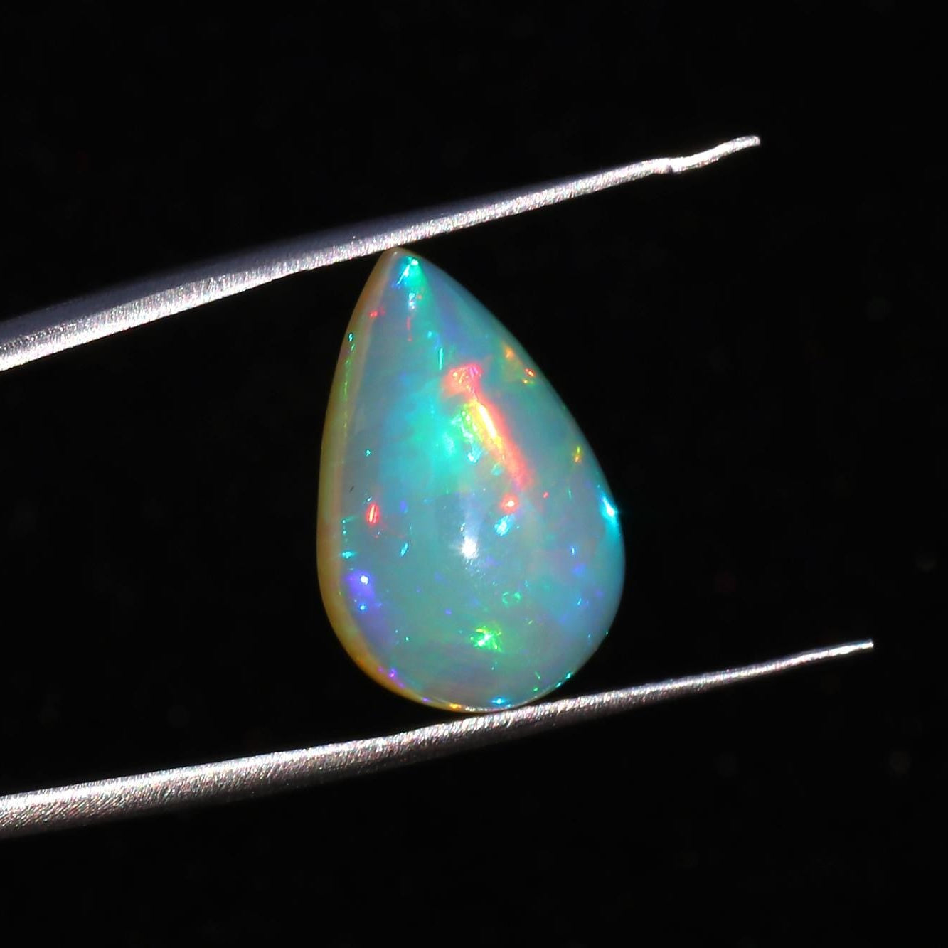 Ethiopian Opal Gemstone: 7.82 Carat Pear Cabochon for Jewelry