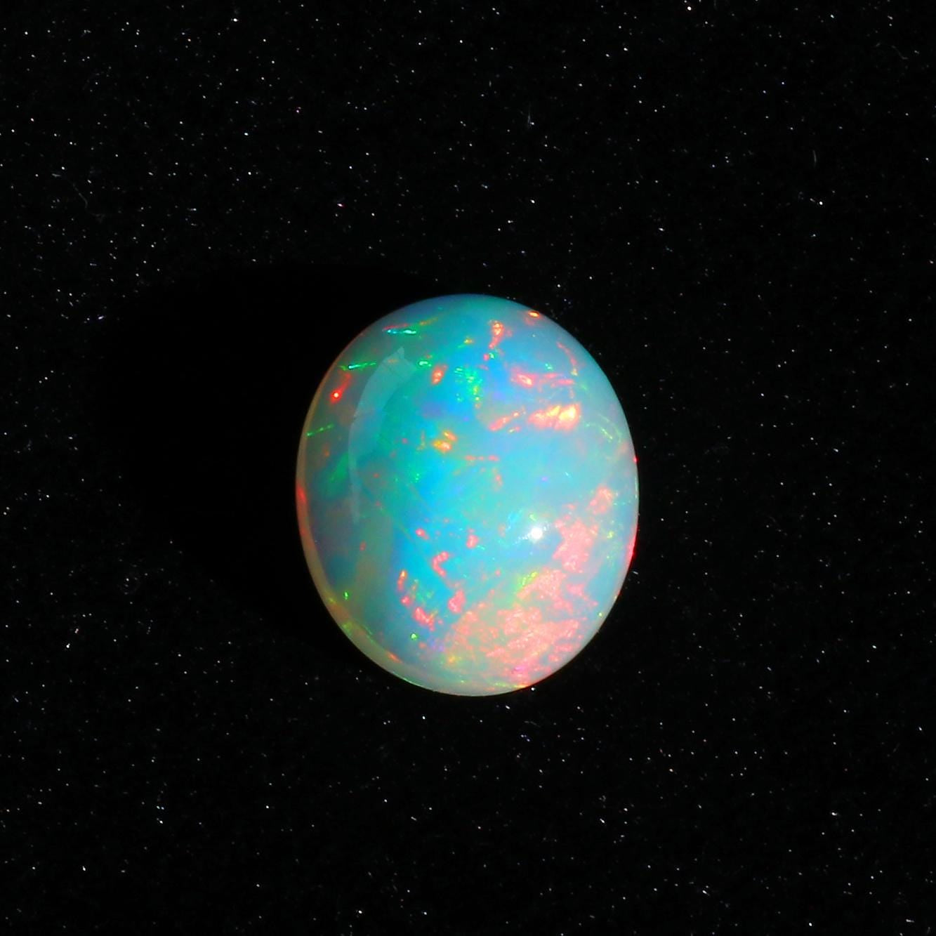 Ethiopian Opal Cabochon: 7.63 Carat Oval Fire Opal Gemstone
