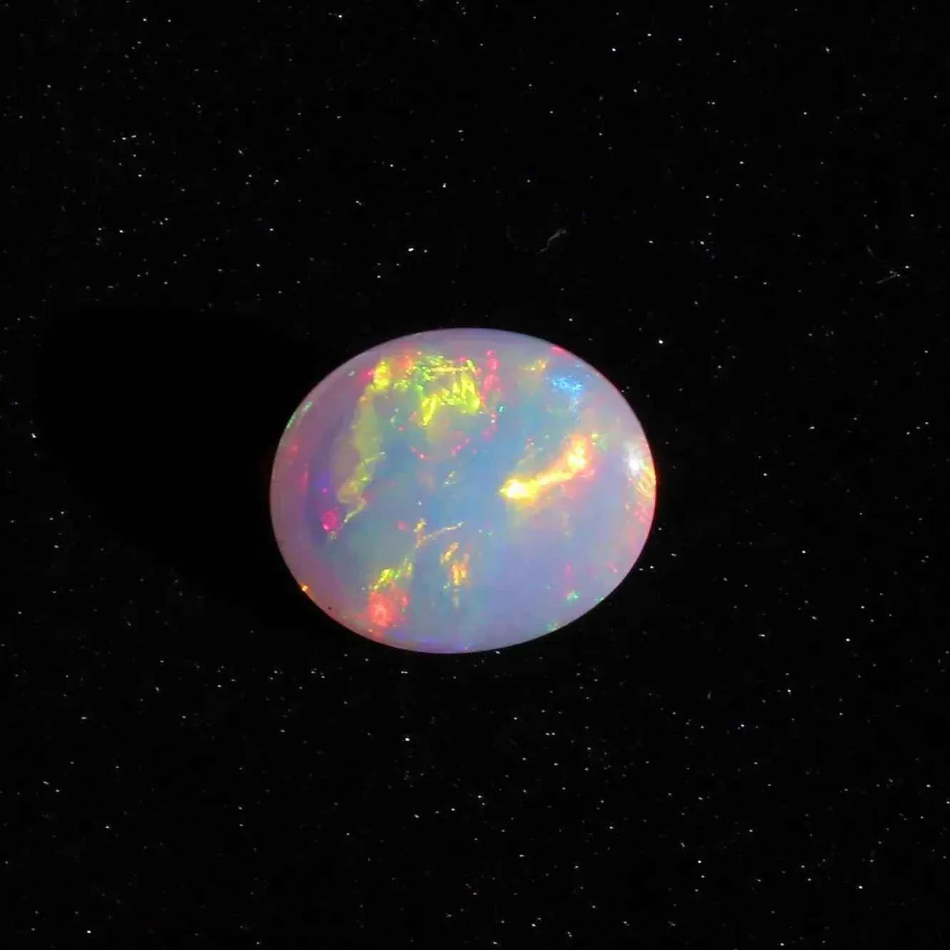 Ethiopian Opal Cabochon: 7.63 Carat Oval Fire Opal Gemstone loose gemstones