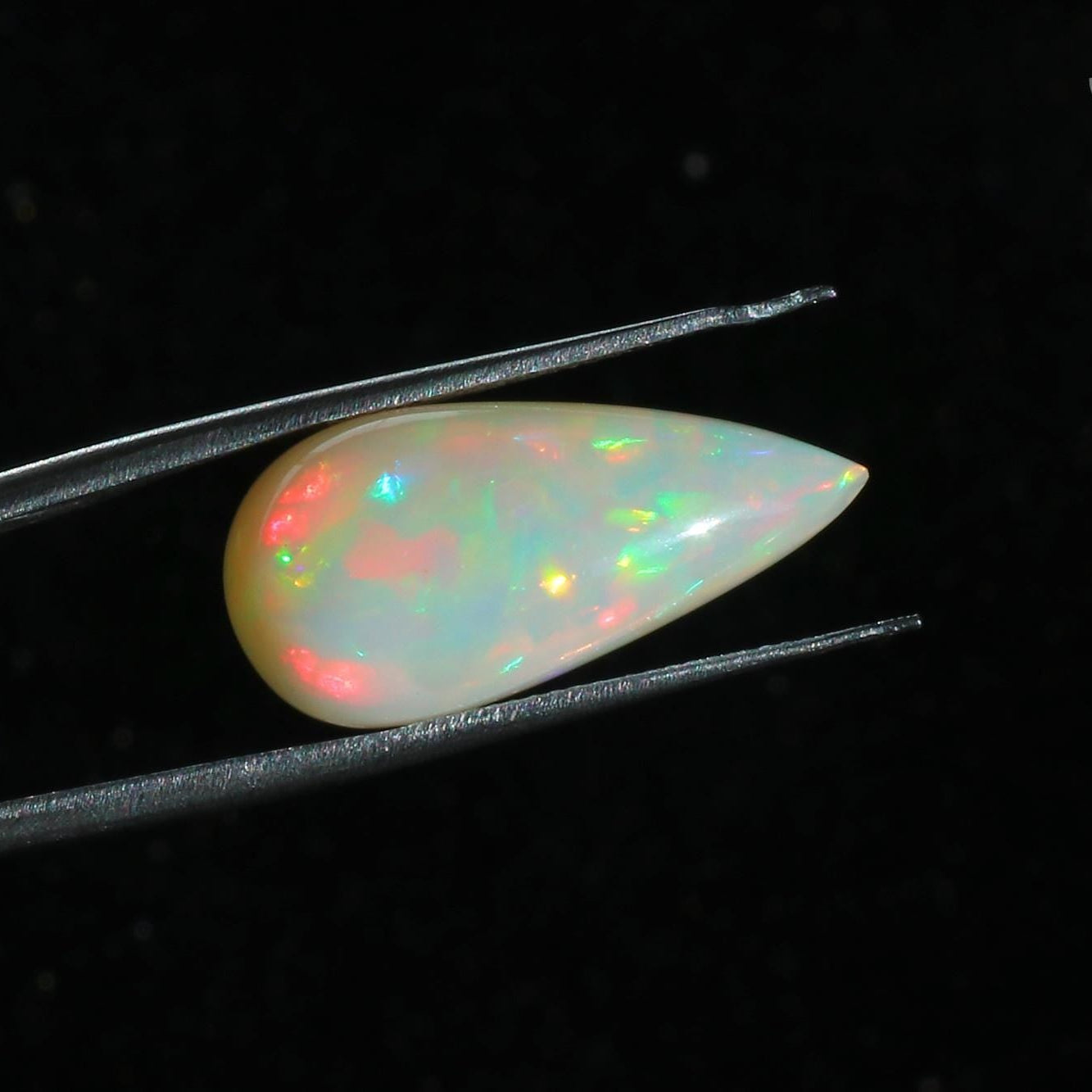 Ethiopian Welo Opal Cabochon: Rainbow Fire Pear Gemstone, 8.73 ct