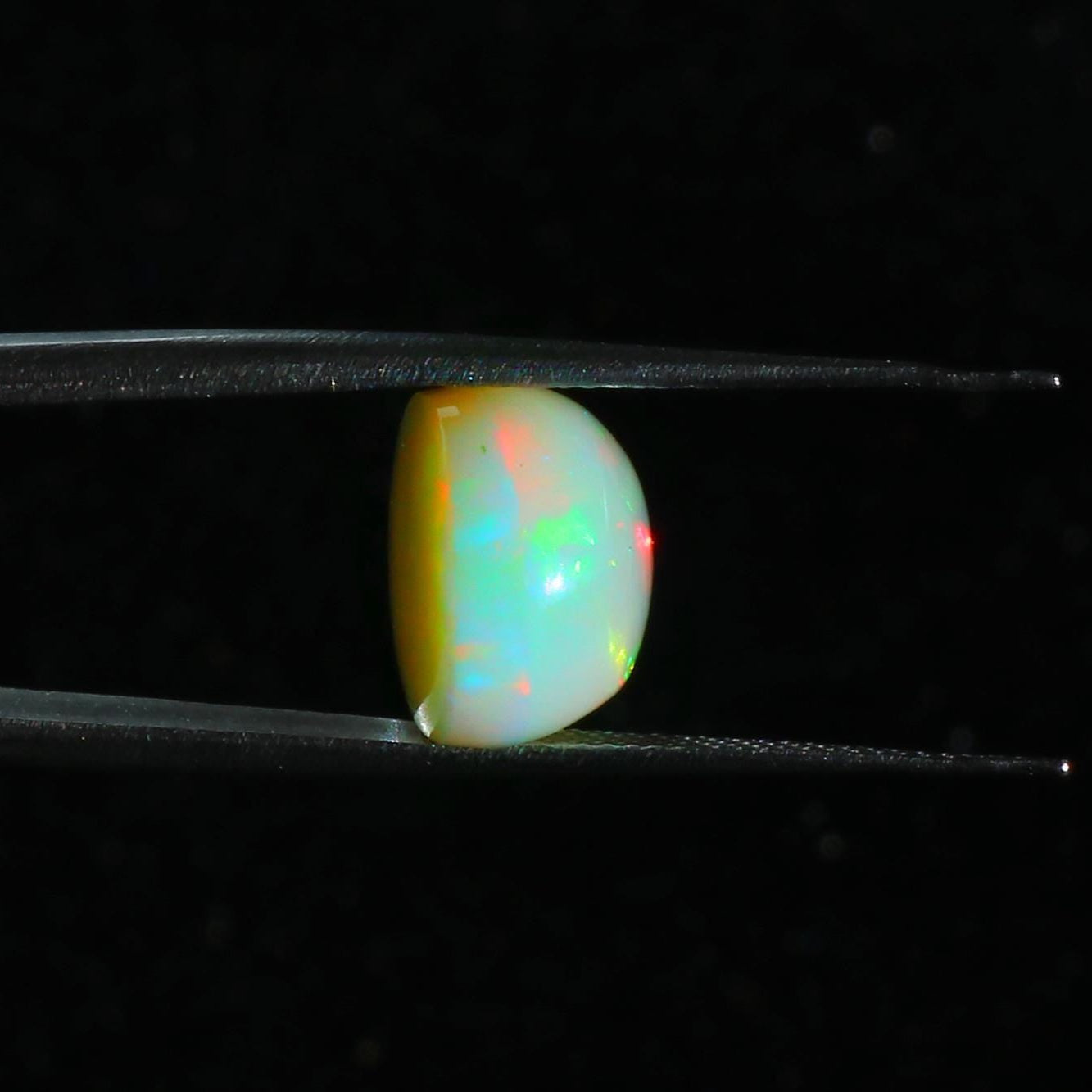 Ethiopian Welo Opal Cabochon: Rainbow Fire Pear Gemstone, 8.73 ct