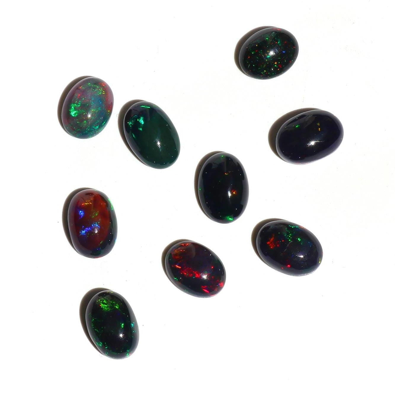Ethiopian Black Opal Cabochons: Multi-Fire Gemstone Lot (11.53ct, 9pc, 7x10mm