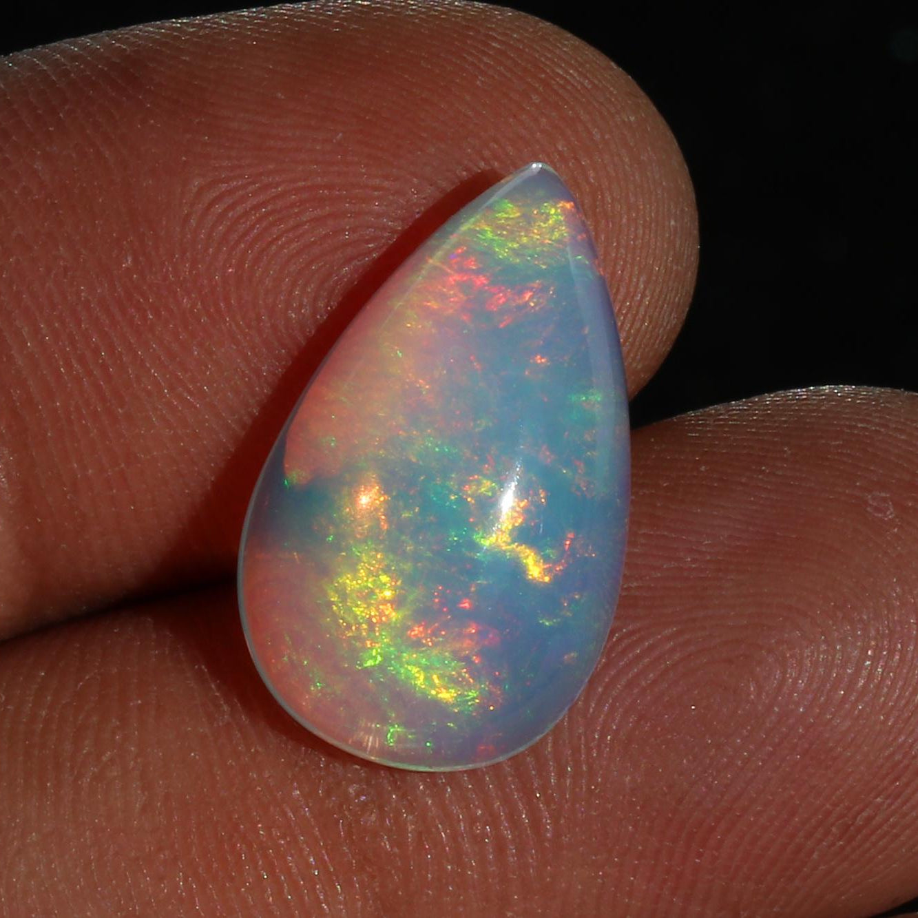 Ethiopian Welo Opal Cabochon: Rainbow Fire Pear-Shape Gemstone, 6.91 CT