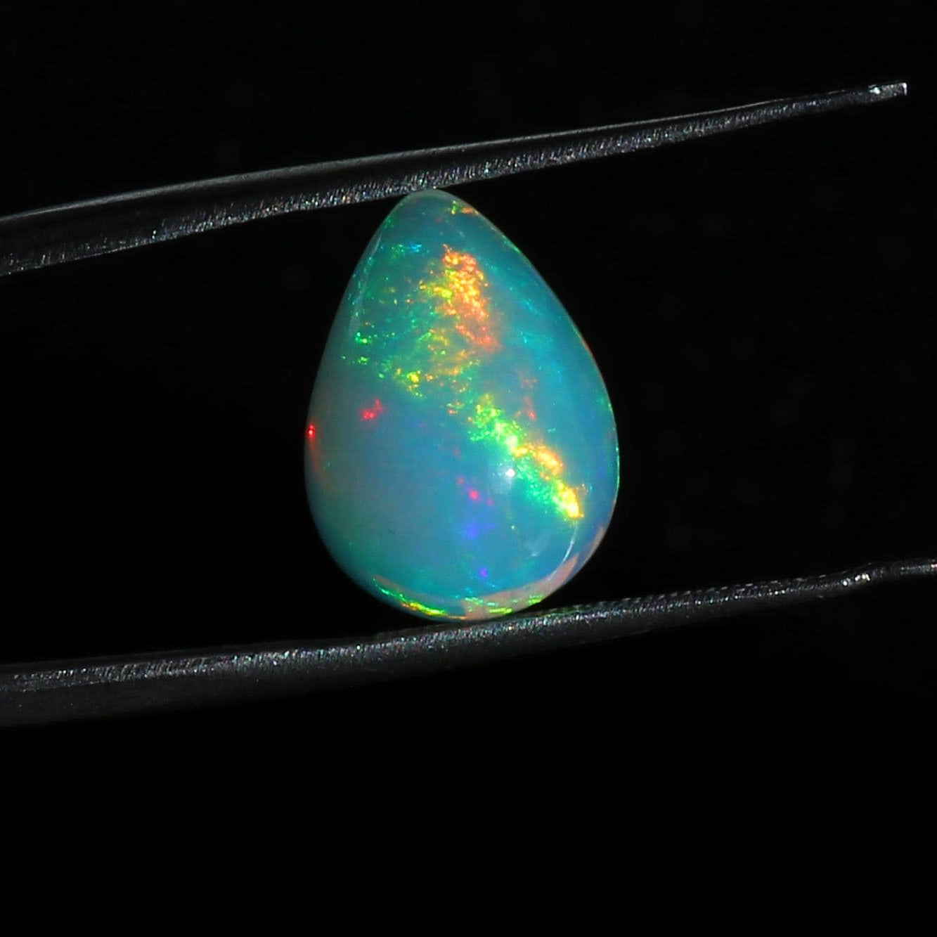 Ethiopian Welo Fire Opal Stone: 4.55 ct Pear Cabochon Gemstone