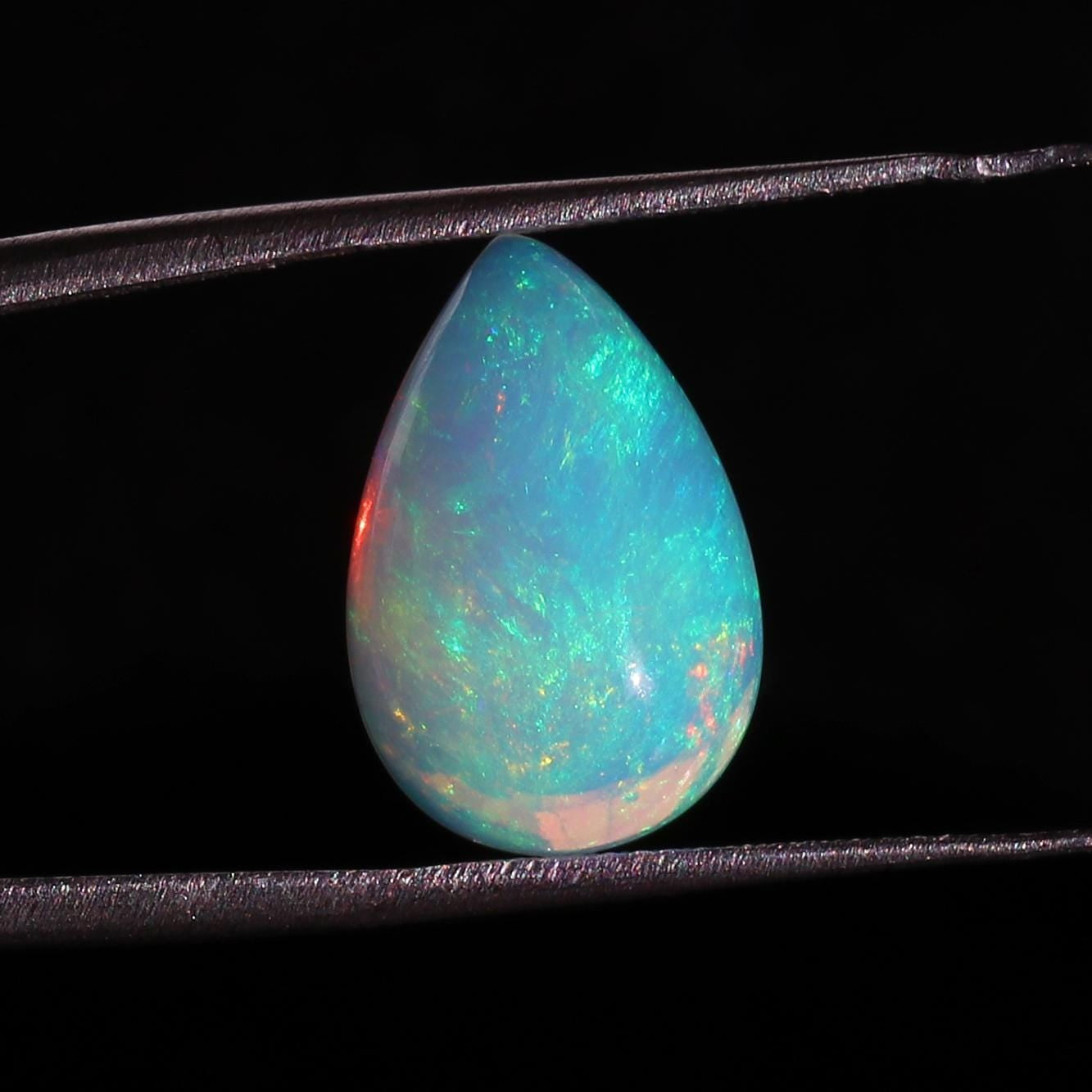 6.57 Cts Ethiopian Opal Stone: Pear Cabochon Gemstone