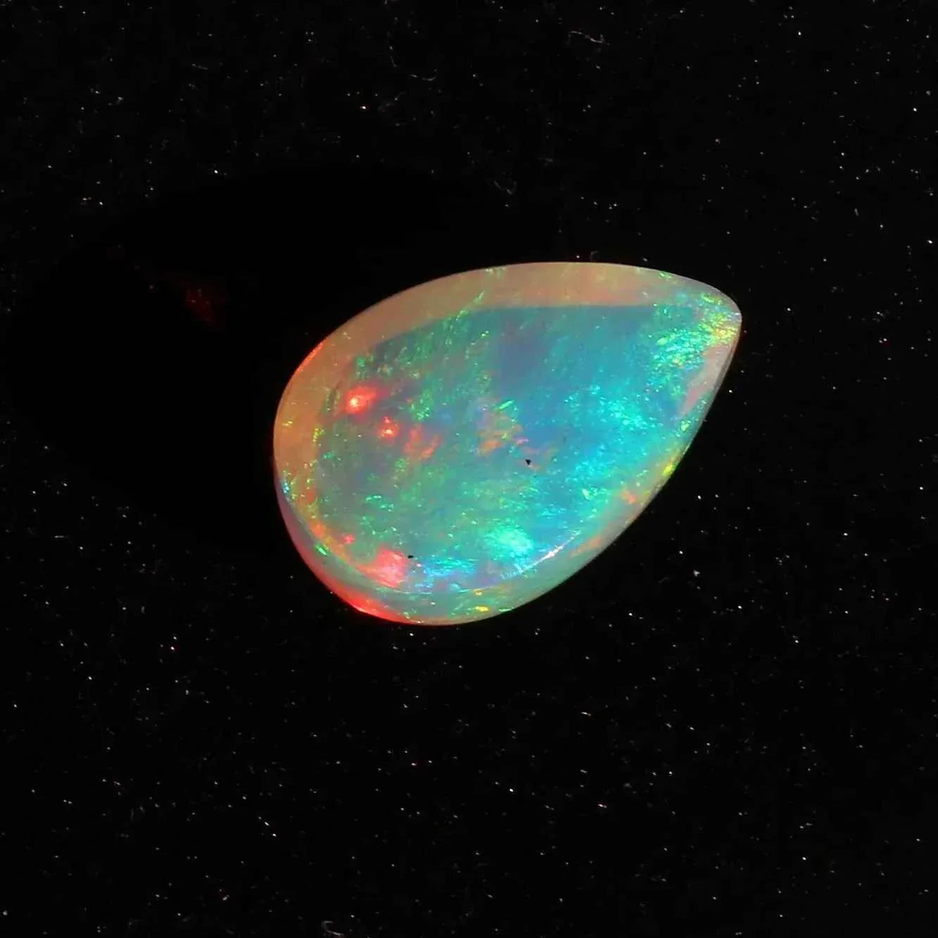 6.57 Cts Ethiopian Opal Stone: Pear Cabochon Gemstone loose gemstones