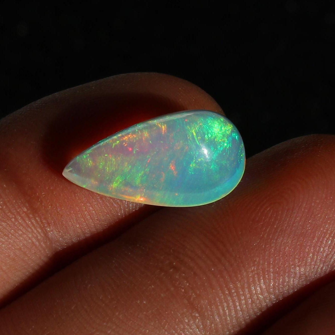 Ethiopian Welo Opal Cabochon: Rainbow Fire Pear-Cut Gemstone, 4.77 CT