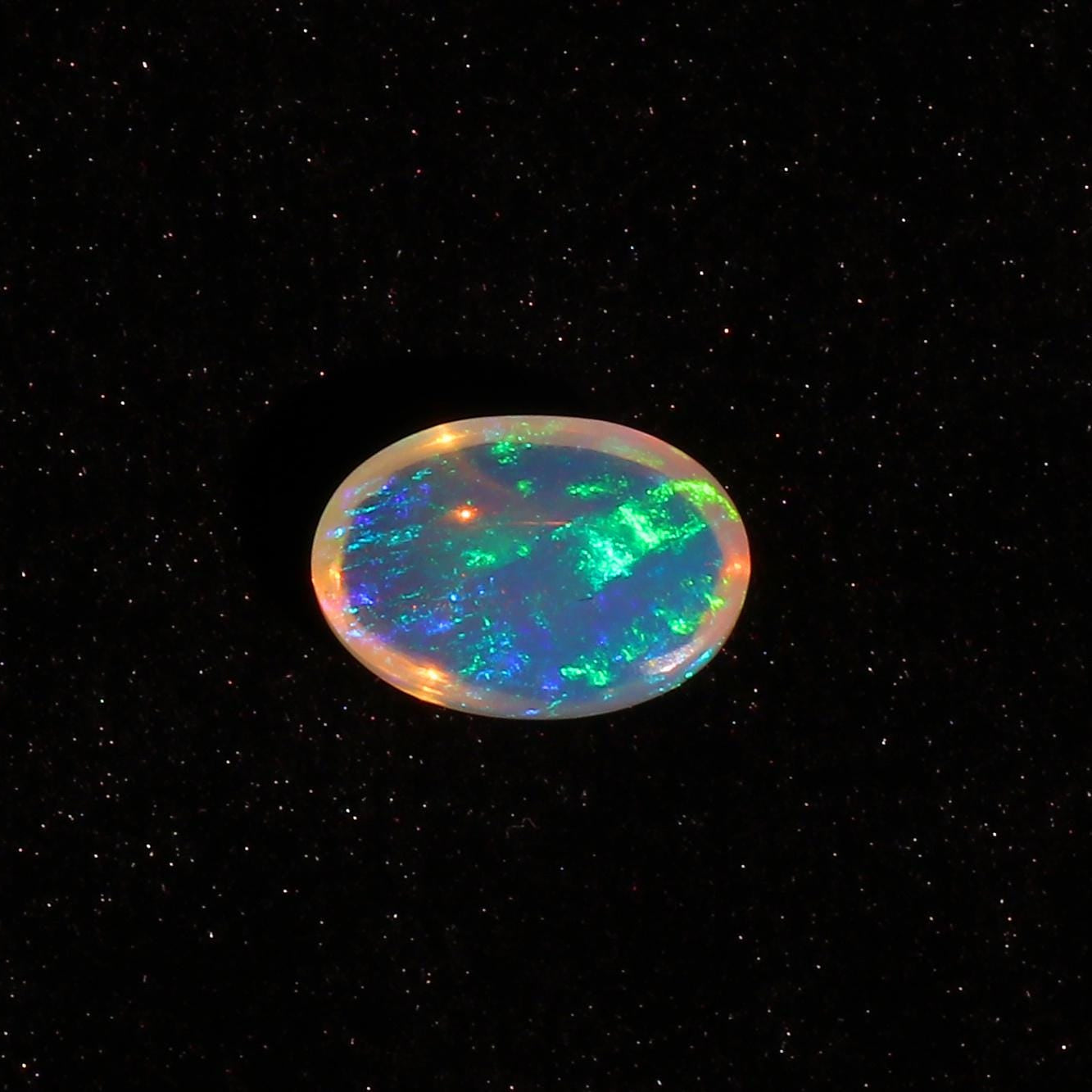 Ethiopian Welo Opal Cabochon: 3.97 Carat Oval Gemstone
