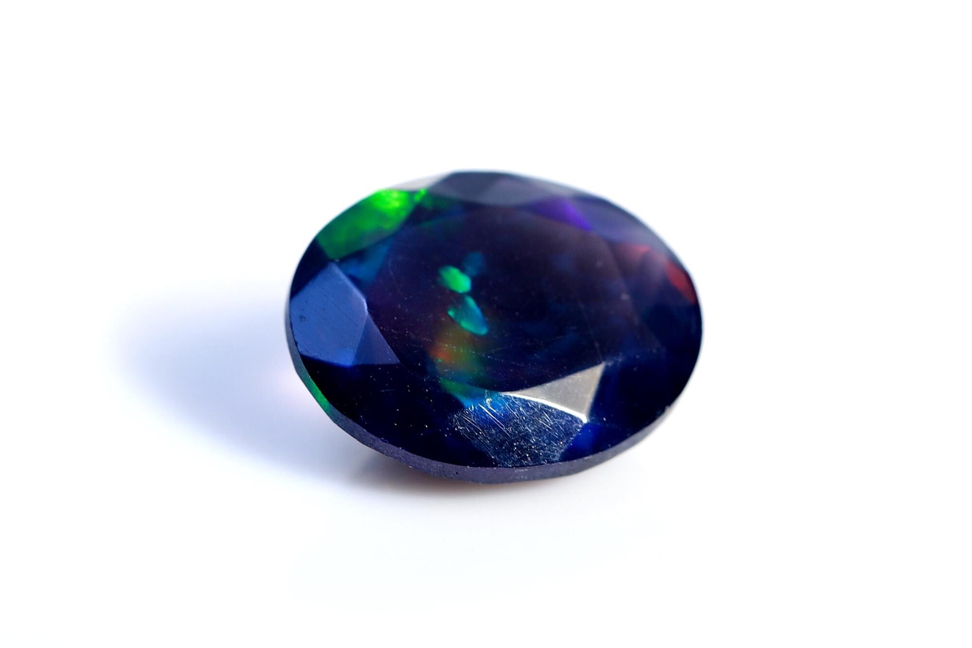 Ethiopian Welo Opal Gemstone: Faceted Black Oval Cut, 1.48 ct