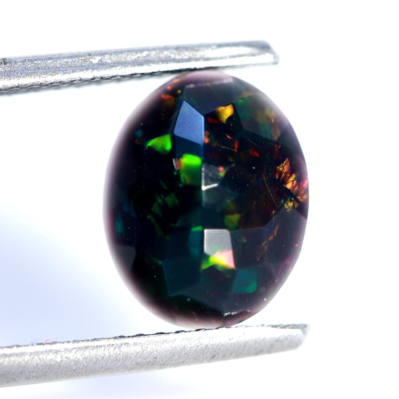 Ethiopian Black Opal Stone: 1.38ct Faceted Oval Cabochon, 8x10mm
