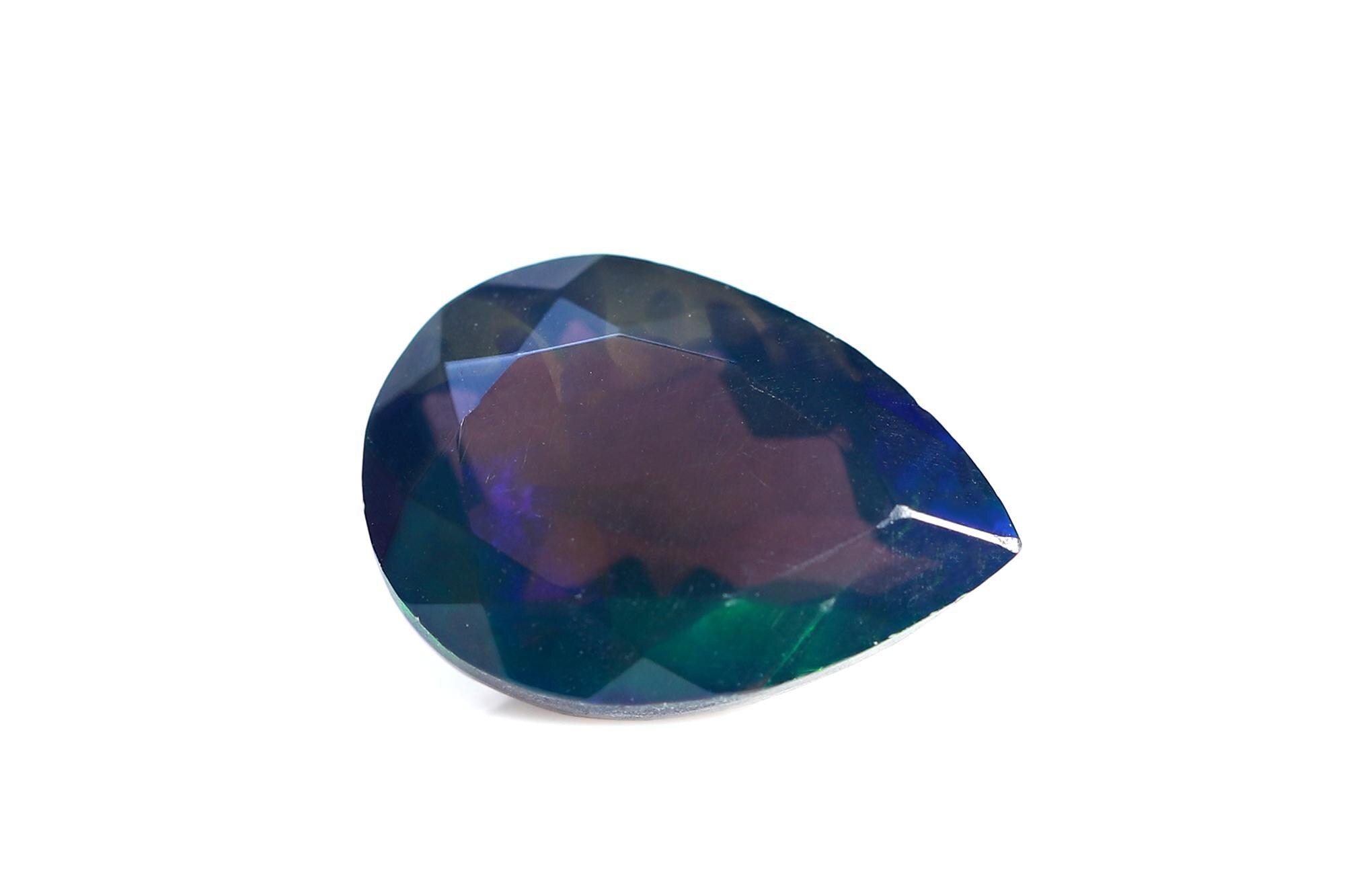 Ethiopian Black Opal Pear Cabochon: Multi-Fire Gemstone (7x10 mm