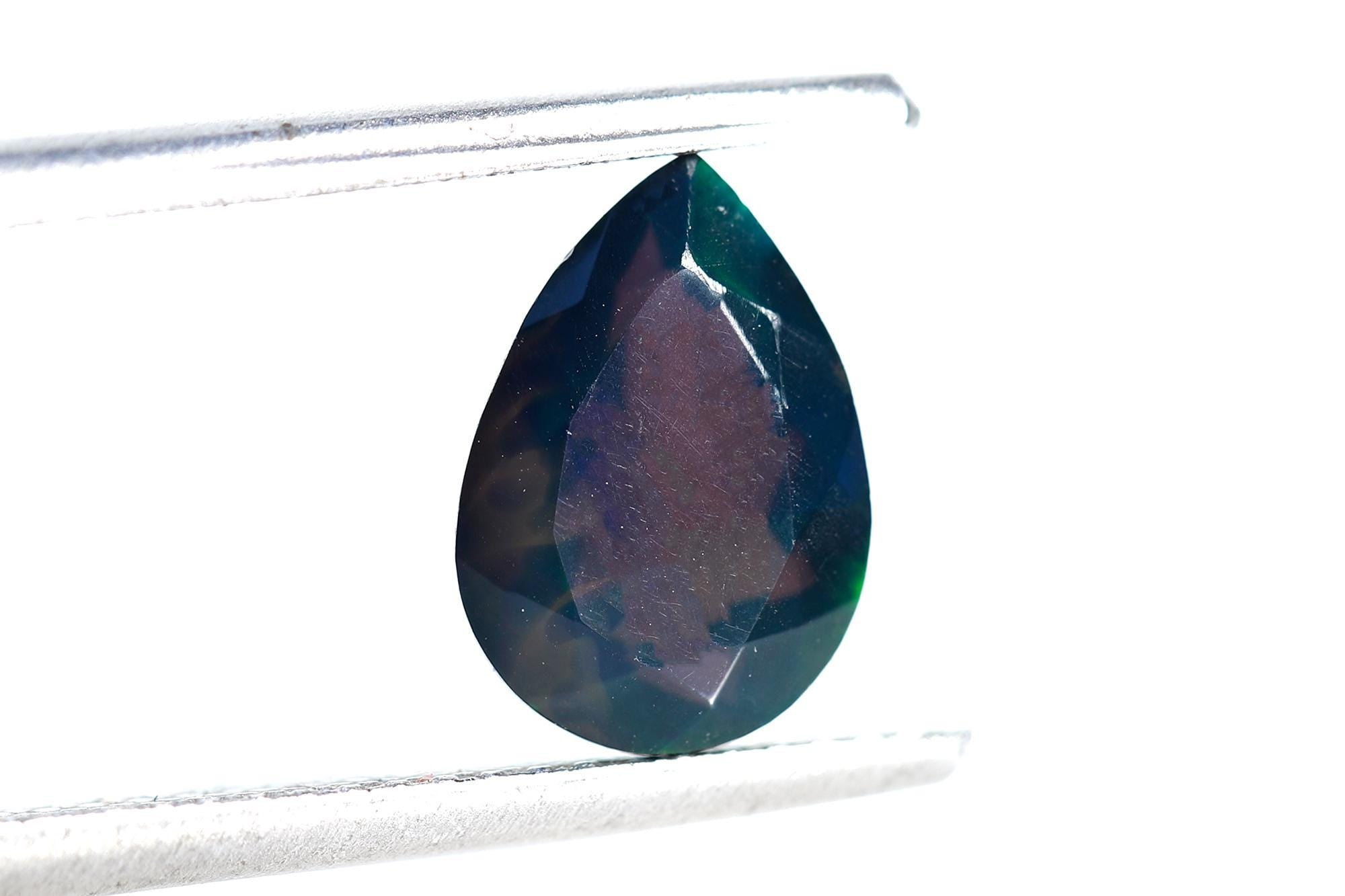 Ethiopian Black Opal Pear Cabochon: Multi-Fire Gemstone (7x10 mm
