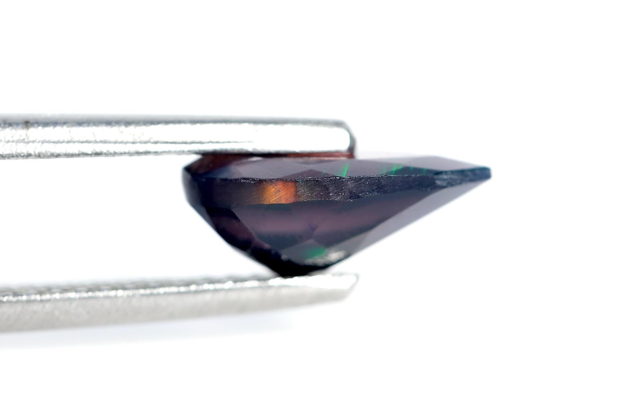 Faceted Black Ethiopian Opal Gemstone: Pear Shape, 7x10mm