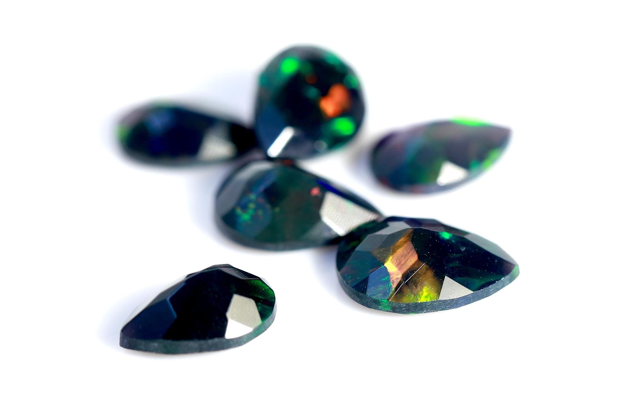 4.78 Ct Ethiopian Welo Black Opal Pear Cabochon: Multi-Fire Gemstone