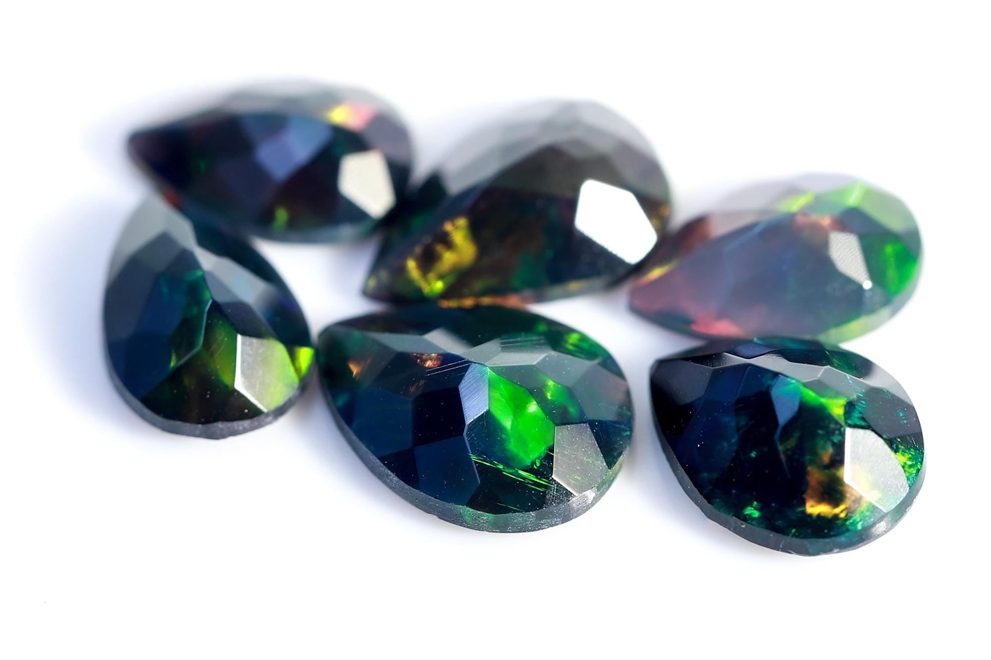 4.78 Ct Ethiopian Welo Black Opal Pear Cabochon: Multi-Fire Gemstone